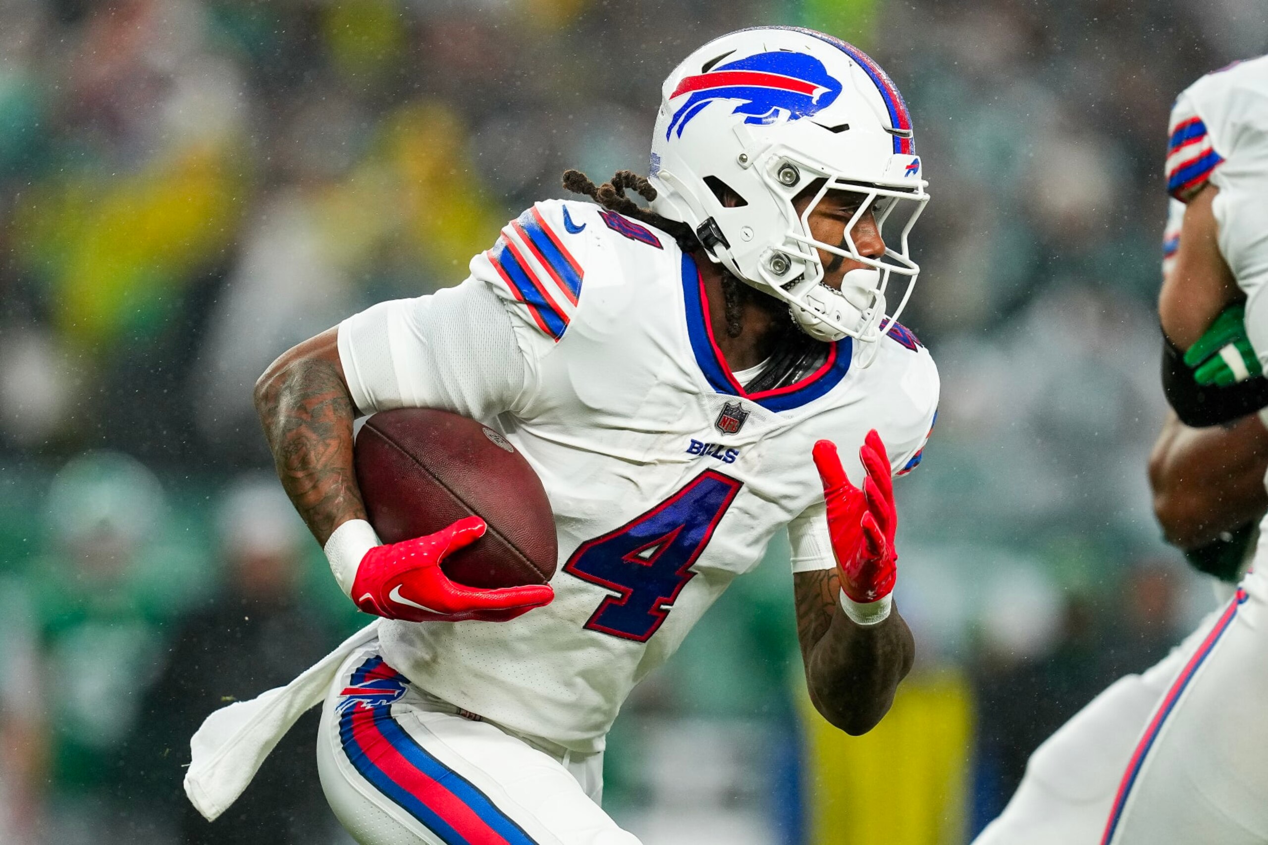 PHILADELPHIA, PENNSYLVANIA - NOVEMBER 26: James Cook #4 of the Buffalo Bills runs the ball during the first quarter against the Philadelphia Eagles at Lincoln Financial Field on November 26, 2023 in Philadelphia, Pennsylvania. (Photo by Mitchell Leff/Getty Images)