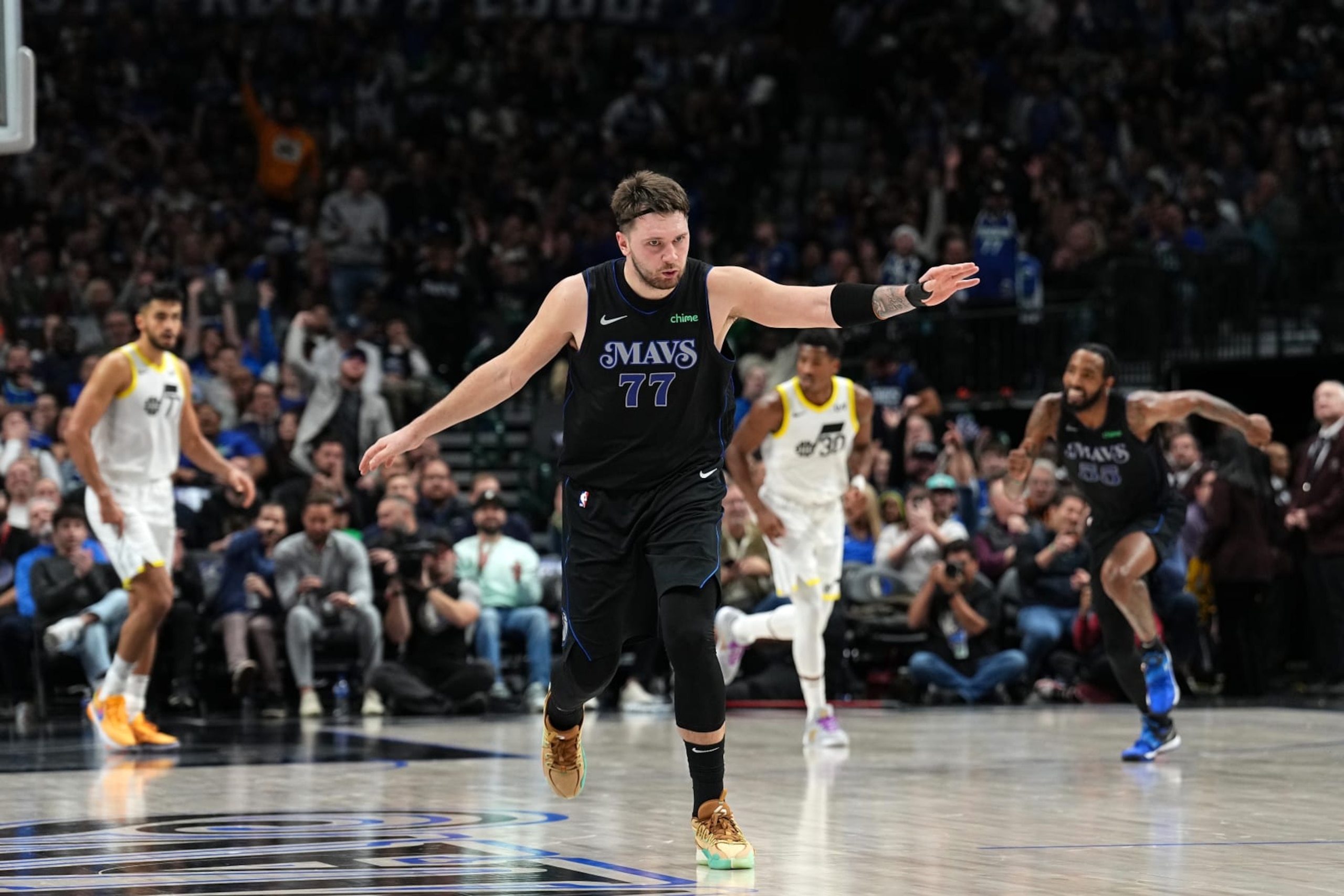 DALLAS, TX - DECEMBER 6 : Luka Doncic #77 of the Dallas Mavericks celebrates during the game against the Utah Jazz on December 6, 2023 at the American Airlines Center in Dallas, Texas. NOTE TO USER: User expressly acknowledges and agrees that, by downloading and or using this photograph, User is consenting to the terms and conditions of the Getty Images License Agreement. Mandatory Copyright Notice: Copyright 2023 NBAE (Photo by Glenn James/NBAE via Getty Images)