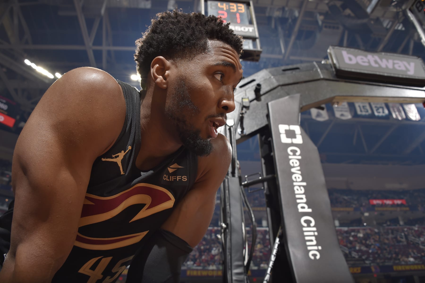 CLEVELAND, OH - DECEMBER 6: Donovan Mitchell #45 of the Cleveland Cavaliers looks on during the game against the Orlando Magic on December 6, 2023 at Rocket Mortgage FieldHouse in Cleveland, Ohio. NOTE TO USER: User expressly acknowledges and agrees that, by downloading and/or using this Photograph, user is consenting to the terms and conditions of the Getty Images License Agreement. Mandatory Copyright Notice: Copyright 2023 NBAE (Photo by David Liam Kyle/NBAE via Getty Images)