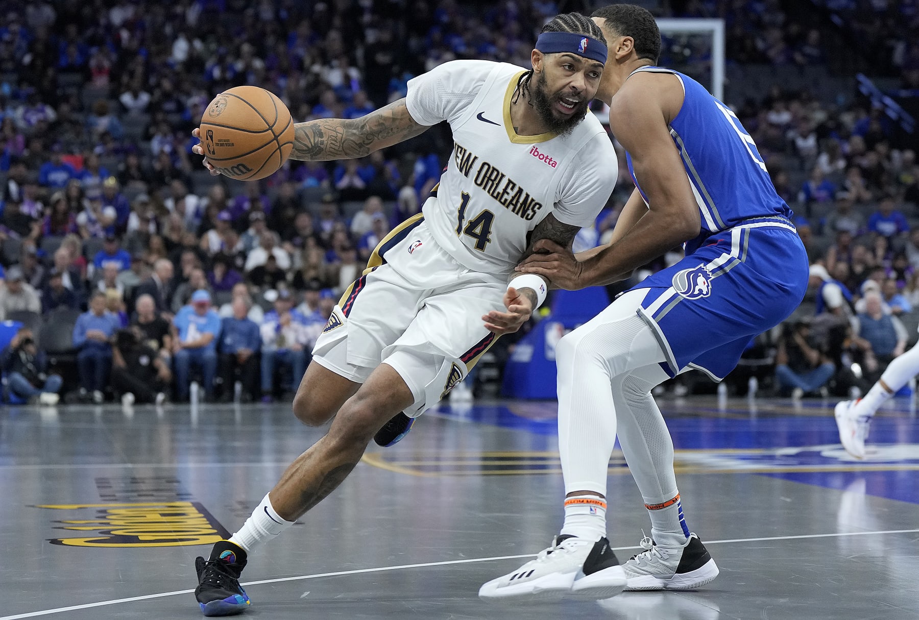 SACRAMENTO, CALIFORNIA - DECEMBER 04: Brandon Ingram #14 of the New Orleans Pelicans looks to drive to the basket on Keegan Murray #13 of the Sacramento Kings in the third quarter of an NBA In-Season Tournament Knockout Round game at Golden 1 Center on December 04, 2023 in Sacramento, California. NOTE TO USER: User expressly acknowledges and agrees that, by downloading and or using this photograph, User is consenting to the terms and conditions of the Getty Images License Agreement. (Photo by Thearon W. Henderson/Getty Images)