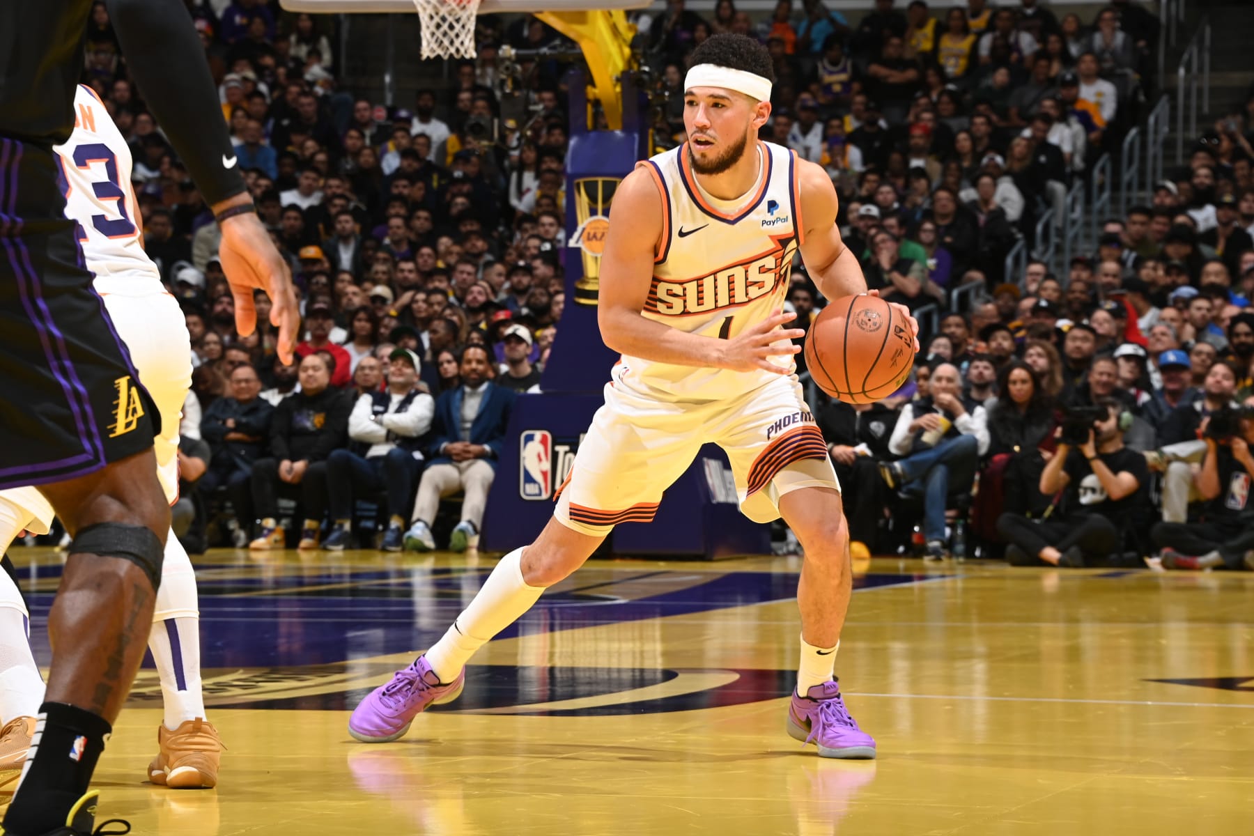 LOS ANGELES, CA - DECEMBER 5: Devin Booker #1 of the Phoenix Suns dribbles the ball during the game against the Los Angeles Lakers during the quarterfinals of the In-Season Tournament on December 5, 2023 at Crypto.Com Arena in Los Angeles, California. NOTE TO USER: User expressly acknowledges and agrees that, by downloading and/or using this Photograph, user is consenting to the terms and conditions of the Getty Images License Agreement. Mandatory Copyright Notice: Copyright 2023 NBAE (Photo by Andrew D. Bernstein/NBAE via Getty Images)
