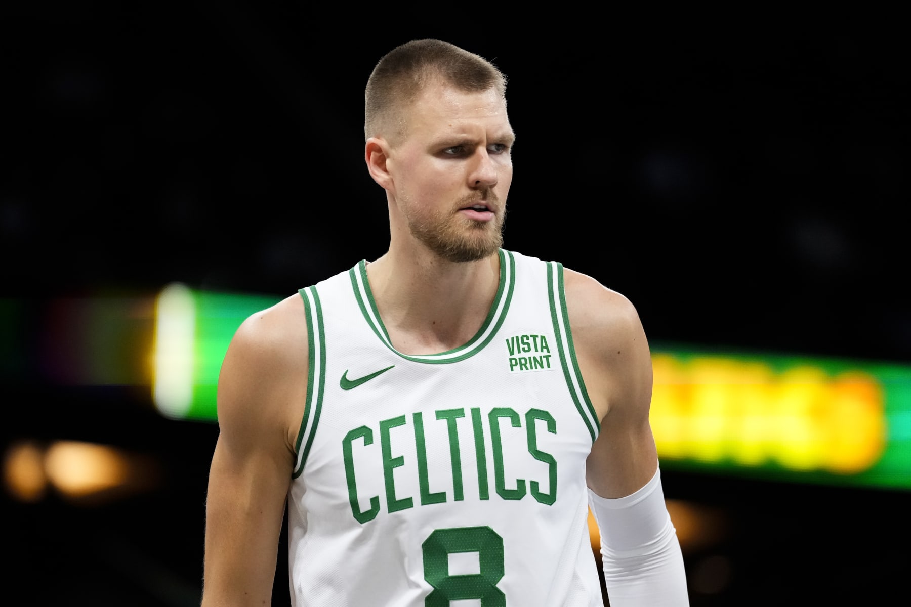 ORLANDO, FLORIDA - NOVEMBER 24: Kristaps Porzingis #8 of the Boston Celtics looks on against the Orlando Magic during the first half at Amway Center on November 24, 2023 in Orlando, Florida. User expressly acknowledges and agrees that, by downloading and/or using this Photograph, user is consenting to the terms and conditions of the Getty Images License Agreement. (Photo by Rich Storry/Getty Images)