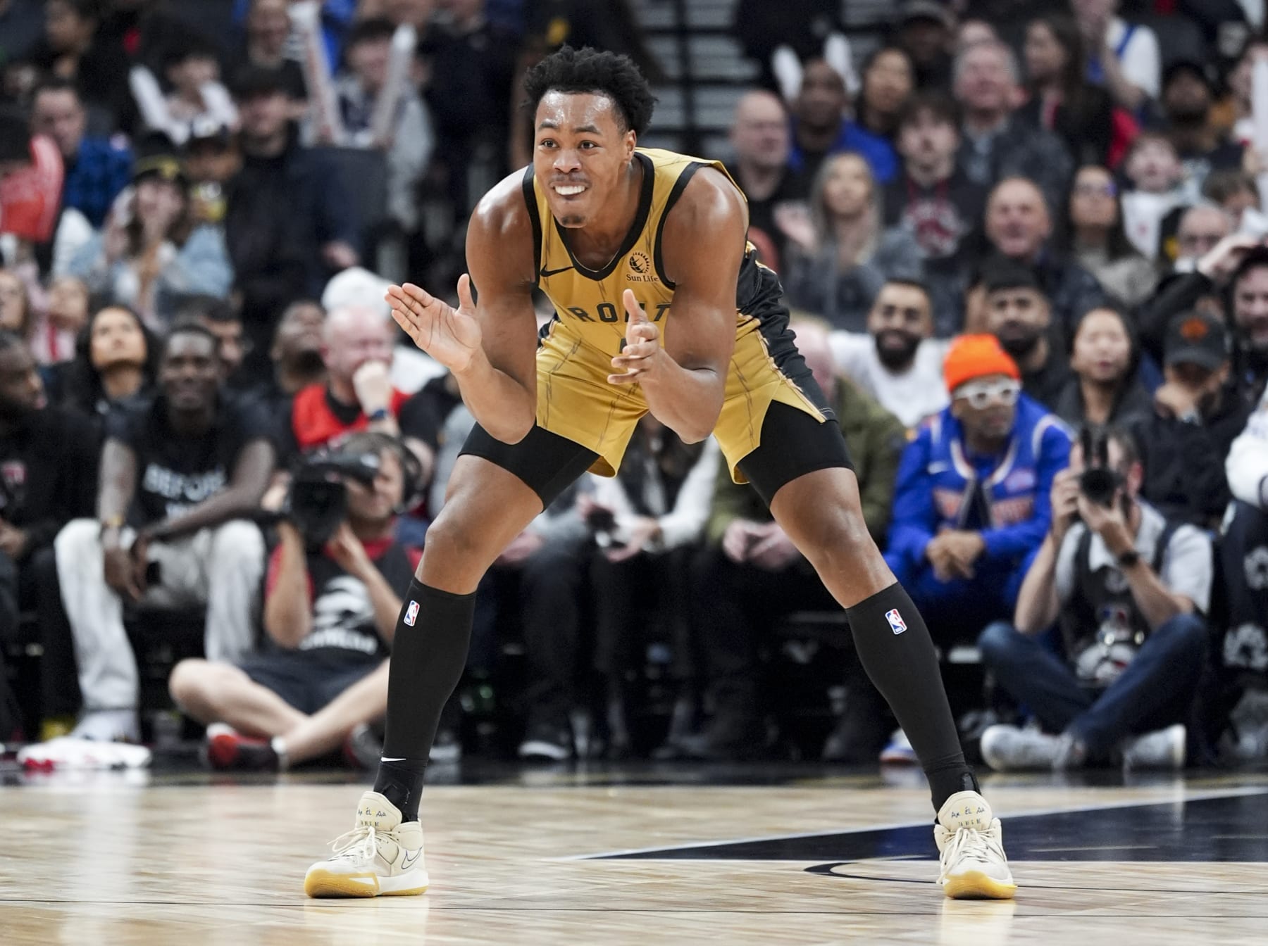 TORONTO, ON - DECEMBER 1: Scottie Barnes #4 of the Toronto Raptors celebrates scoring against the New York Knicks during the second half of their basketball game at the Scotiabank Arena on December 1, 2023 in Toronto, Ontario, Canada. NOTE TO USER: User expressly acknowledges and agrees that, by downloading and/or using this Photograph, user is consenting to the terms and conditions of the Getty Images License Agreement. (Photo by Mark Blinch/Getty Images)
