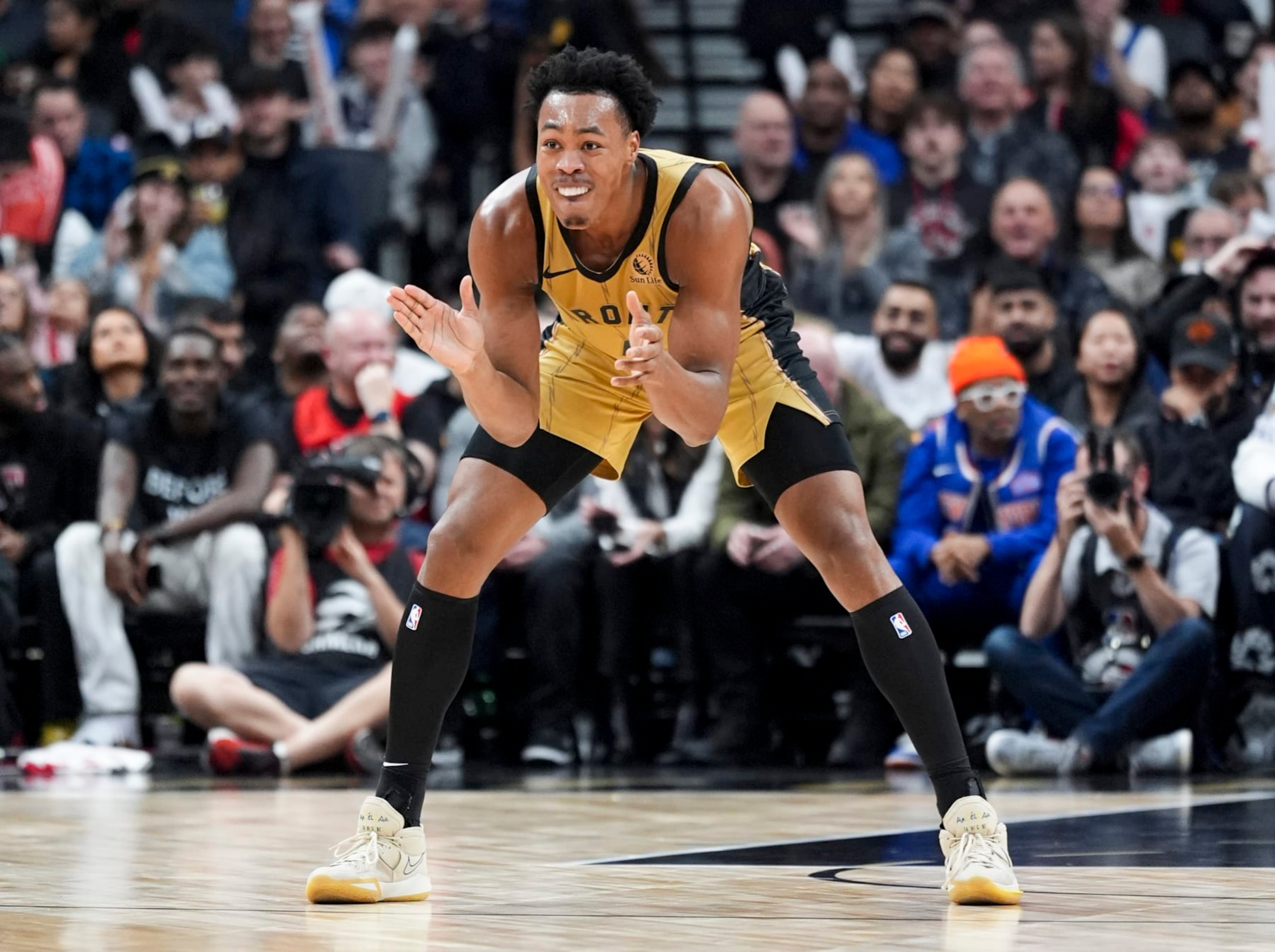 TORONTO, ON - DECEMBER 1: Scottie Barnes #4 of the Toronto Raptors celebrates scoring against the New York Knicks during the second half of their basketball game at the Scotiabank Arena on December 1, 2023 in Toronto, Ontario, Canada. NOTE TO USER: User expressly acknowledges and agrees that, by downloading and/or using this Photograph, user is consenting to the terms and conditions of the Getty Images License Agreement. (Photo by Mark Blinch/Getty Images)