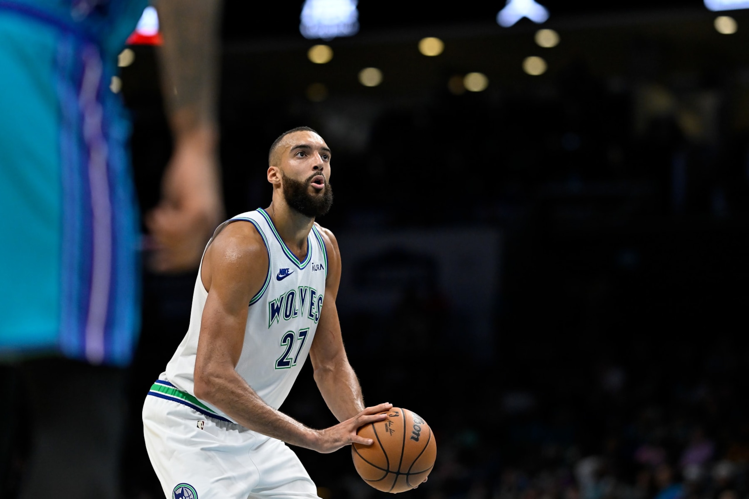 CHARLOTTE, NORTH CAROLINA - DECEMBER 02: Rudy Gobert #27 of the Minnesota Timberwolves shoots a free throw during the second half of his game against the Charlotte Hornets at Spectrum Center on December 02, 2023 in Charlotte, North Carolina. NOTE TO USER: User expressly acknowledges and agrees that, by downloading and or using this photograph, User is consenting to the terms and conditions of the Getty Images License Agreement.   (Photo by Matt Kelley/Getty Images)