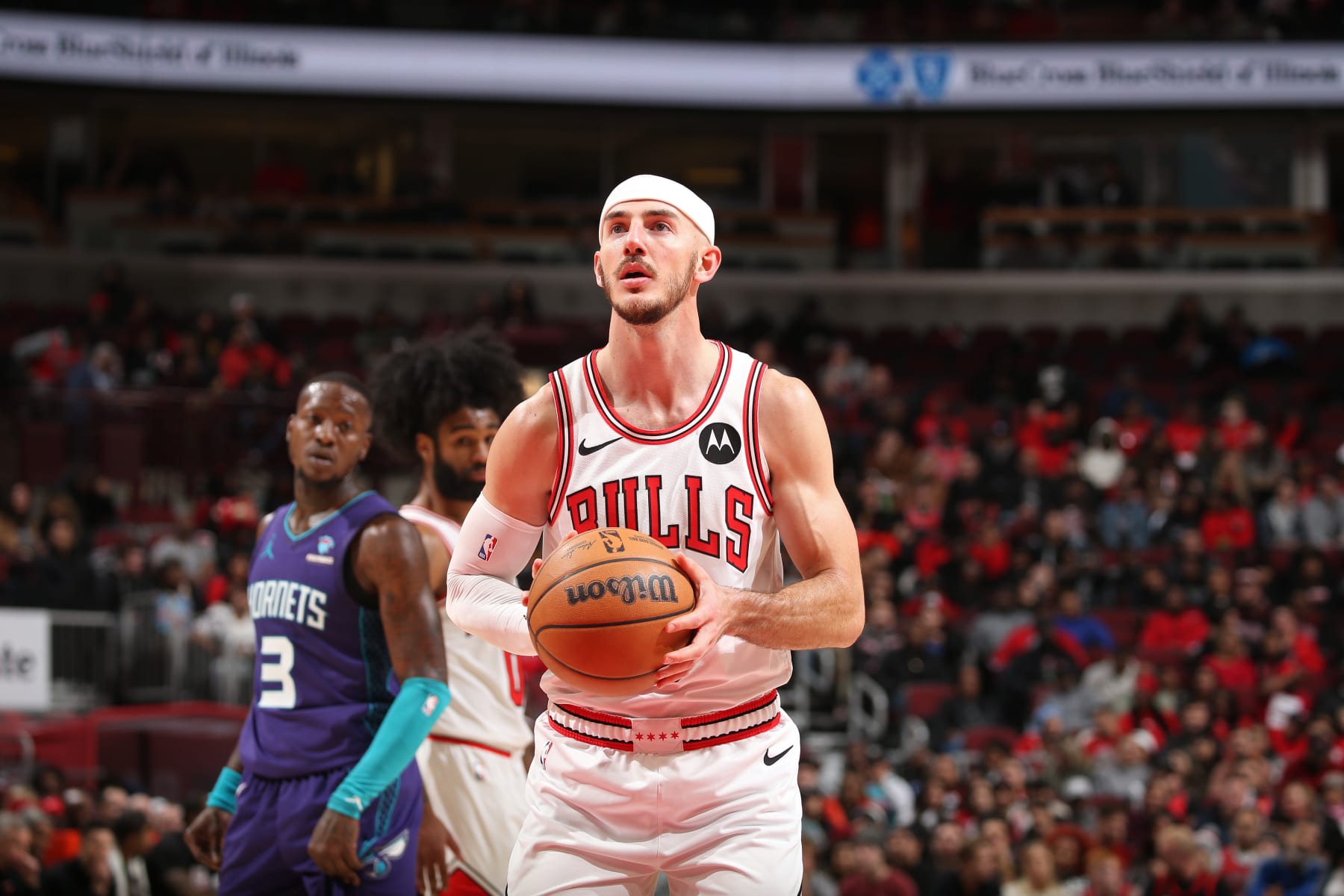CHICAGO, IL - DECEMBER 6: Alex Caruso #6 of the Chicago Bulls shoots a free throw during the game against the Charlotte Hornets on December 6, 2023 at the United Center in Chicago, Illinois. NOTE TO USER: User expressly acknowledges and agrees that, by downloading and or using this Photograph, user is consenting to the terms and conditions of the Getty Images License Agreement. Mandatory Copyright Notice: Copyright 2023 NBAE (Photo by Gary Dineen/NBAE via Getty Images).