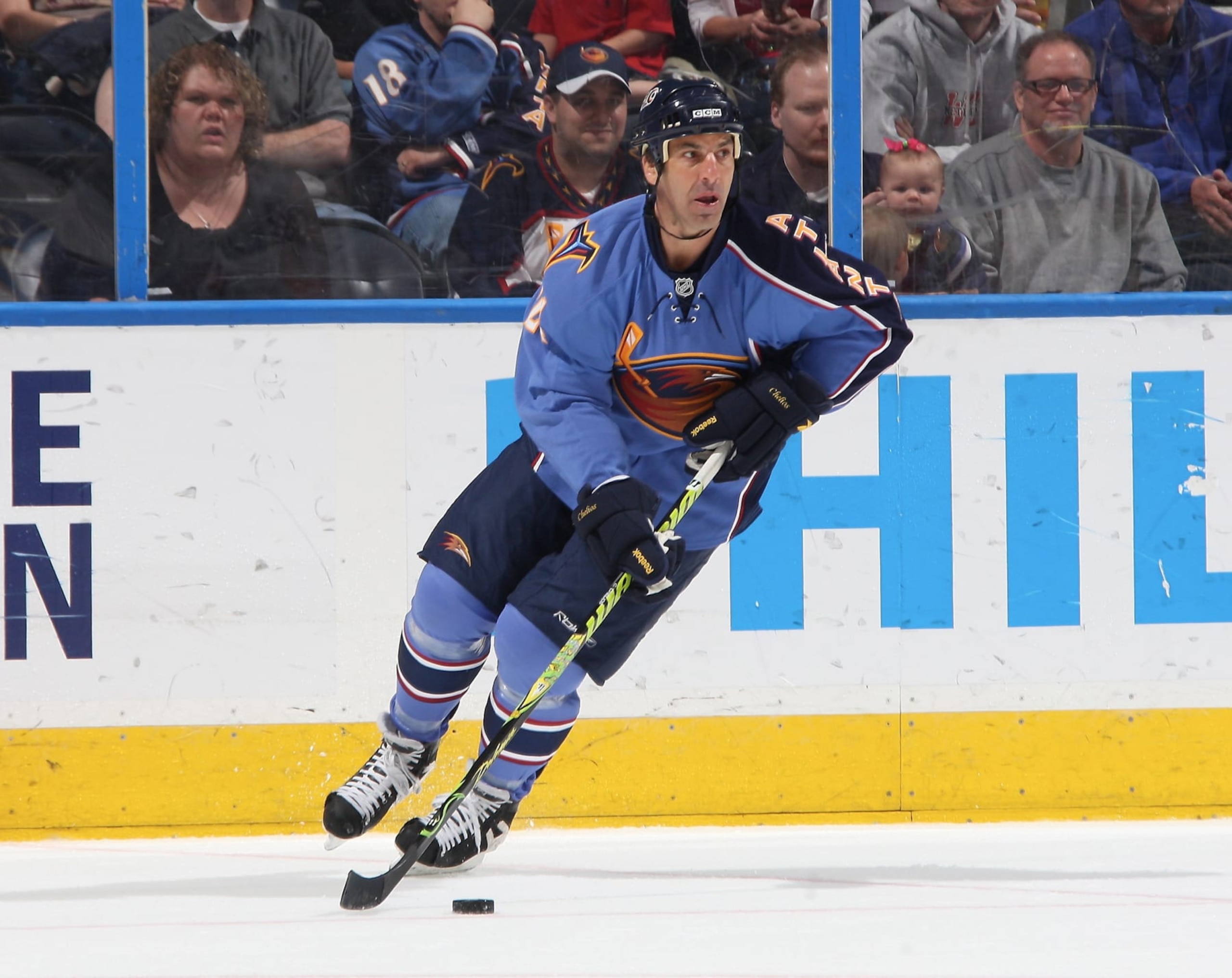 ATLANTA - APRIL 6: Chris Chelios #24 of the Atlanta Thrashers carries the puck against the New Jersey Devils at Philips Arena on April 6, 2010 in Atlanta, Georgia. (Photo by Scott Cunningham/NHLI via Getty Images)