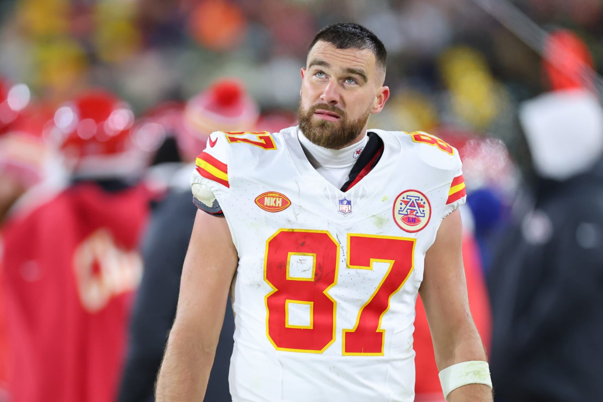 GREEN BAY, WISCONSIN - DECEMBER 03: Travis Kelce #87 of the Kansas City Chiefs stands on the sideline during the second half against the Green Bay Packers at Lambeau Field on December 03, 2023 in Green Bay, Wisconsin. (Photo by Stacy Revere/Getty Images)