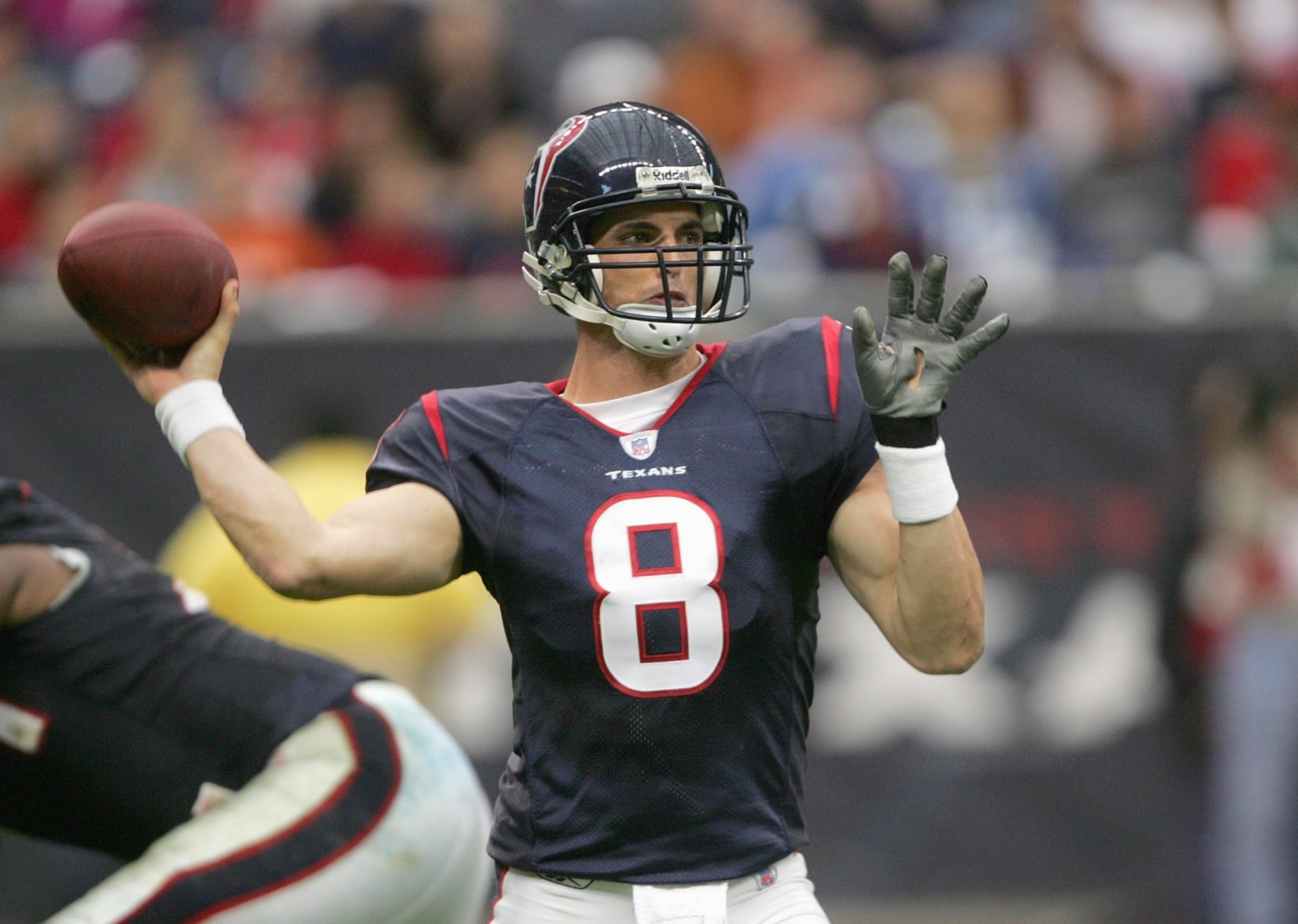 HOUSTON - DECEMBER 10: Quarterback David Carr #8 of the Houston Texans passes the ball during the game against the Tennessee Titans on December 10, 2006 at Reliant Stadium in Houston, Texas. The Titans won 26-20 in overtime. (Photo by Stephen Dunn/Getty Images)