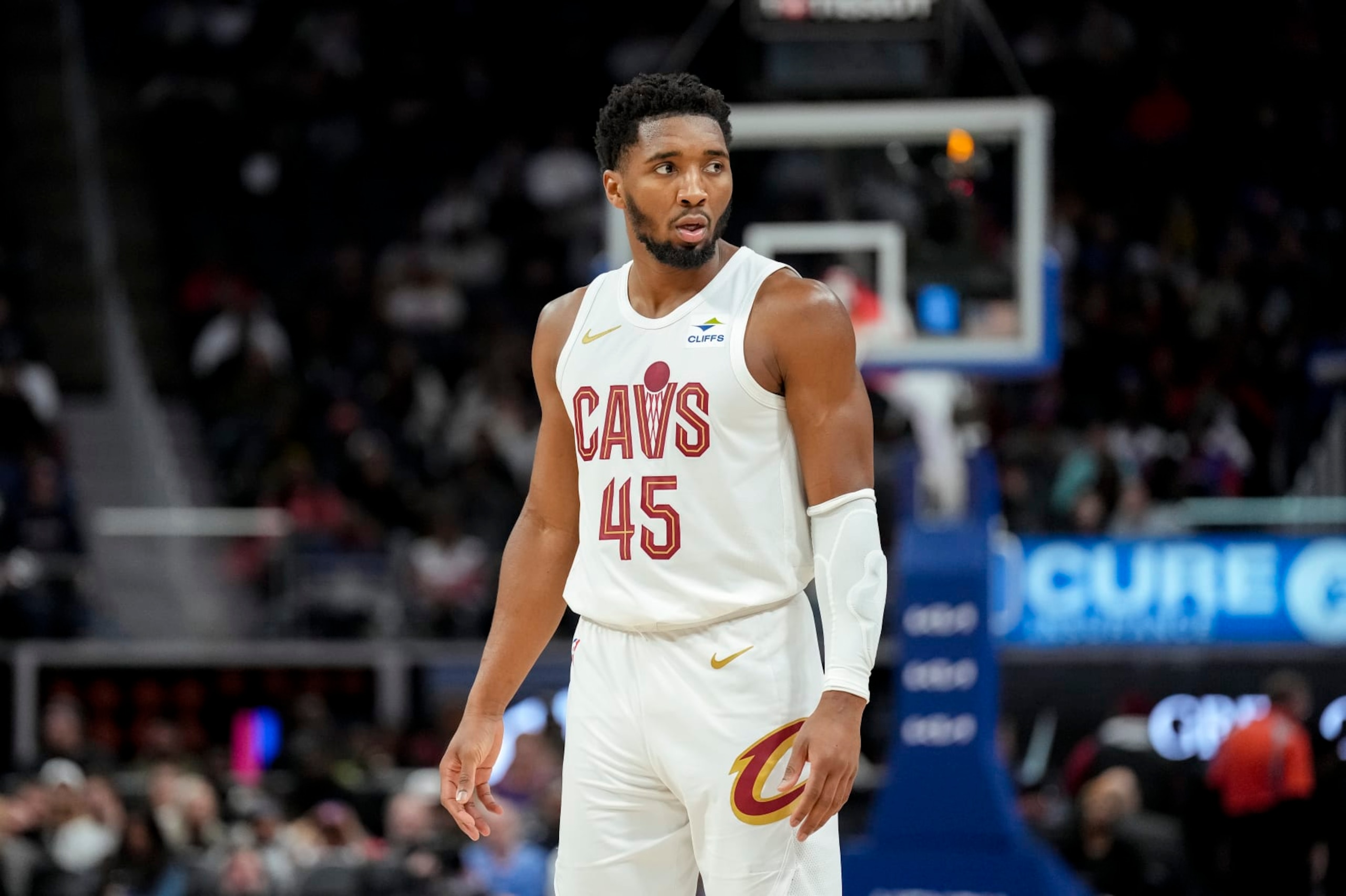 DETROIT, MICHIGAN - DECEMBER 02: Donovan Mitchell #45 of the Cleveland Cavaliers looks on against the Detroit Pistons at Little Caesars Arena on December 02, 2023 in Detroit, Michigan. NOTE TO USER: User expressly acknowledges and agrees that, by downloading and or using this photograph, User is consenting to the terms and conditions of the Getty Images License Agreement. (Photo by Nic Antaya/Getty Images) DETROIT, MICHIGAN - DECEMBER 02: Donovan Mitchell #45 of the Cleveland Cavaliers looks on against the Detroit Pistons at Little Caesars Arena on December 02, 2023 in Detroit, Michigan. NOTE TO USER: User expressly acknowledges and agrees that, by downloading and or using this photograph, User is consenting to the terms and conditions of the Getty Images License Agreement. (Photo by Nic Antaya/Getty Images)