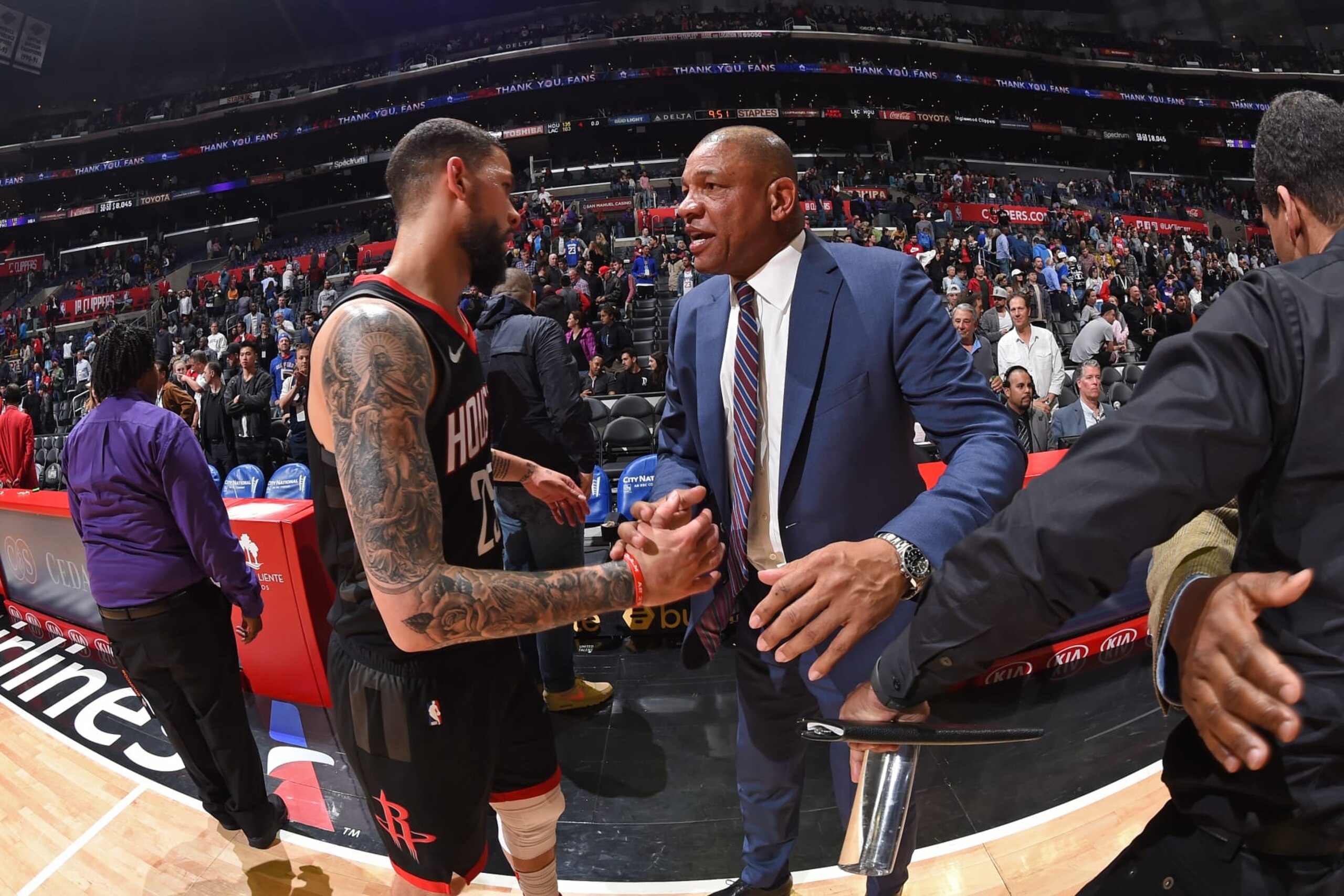 LOS ANGELES, CA - APRIL 3: Head Coach Doc Rivers of the LA Clippers and Austin Rivers #25 of the Houston Rockets after a game on April 3, 2019 at STAPLES Center in Los Angeles, California. NOTE TO USER: User expressly acknowledges and agrees that, by downloading and/or using this Photograph, user is consenting to the terms and conditions of the Getty Images License Agreement. Mandatory Copyright Notice: Copyright 2019 NBAE (Photo by Andrew D. Bernstein/NBAE via Getty Images)