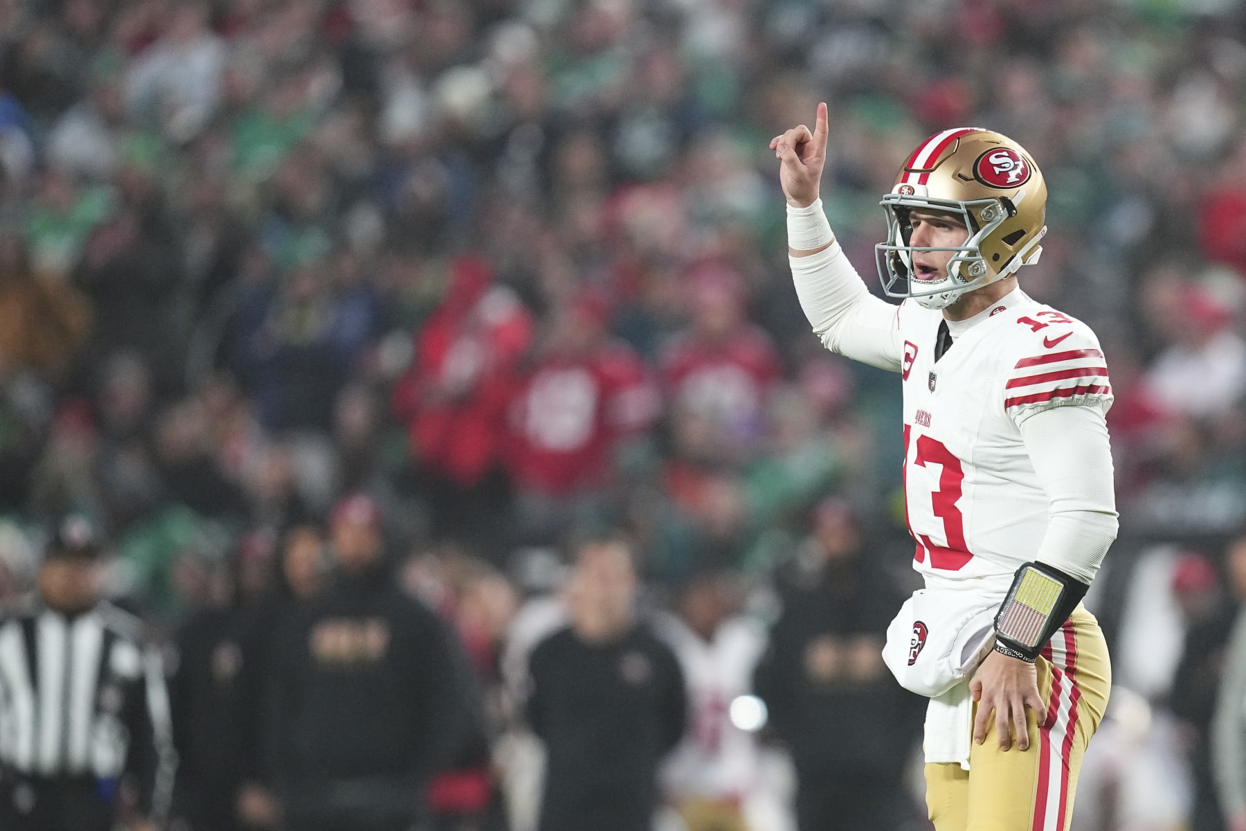 PHILADELPHIA, PENNSYLVANIA - DECEMBER 3: Brock Purdy #13 of the San Francisco 49ers signals against the Philadelphia Eagles at Lincoln Financial Field on December 3, 2023 in Philadelphia, Pennsylvania. (Photo by Mitchell Leff/Getty Images) PHILADELPHIA, PENNSYLVANIA - DECEMBER 3: Brock Purdy #13 of the San Francisco 49ers signals against the Philadelphia Eagles at Lincoln Financial Field on December 3, 2023 in Philadelphia, Pennsylvania. (Photo by Mitchell Leff/Getty Images)