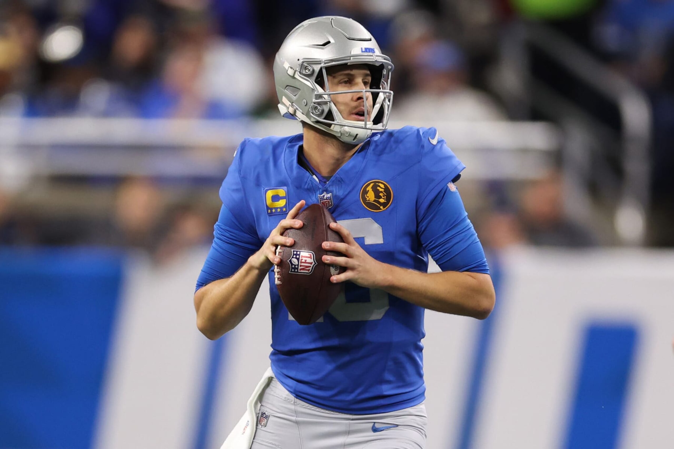 DETROIT, MICHIGAN - NOVEMBER 23: Jared Goff #16 of the Detroit Lions looks to pass against the Green Bay Packers during the first quarter of the game at Ford Field on November 23, 2023 in Detroit, Michigan. (Photo by Gregory Shamus/Getty Images)