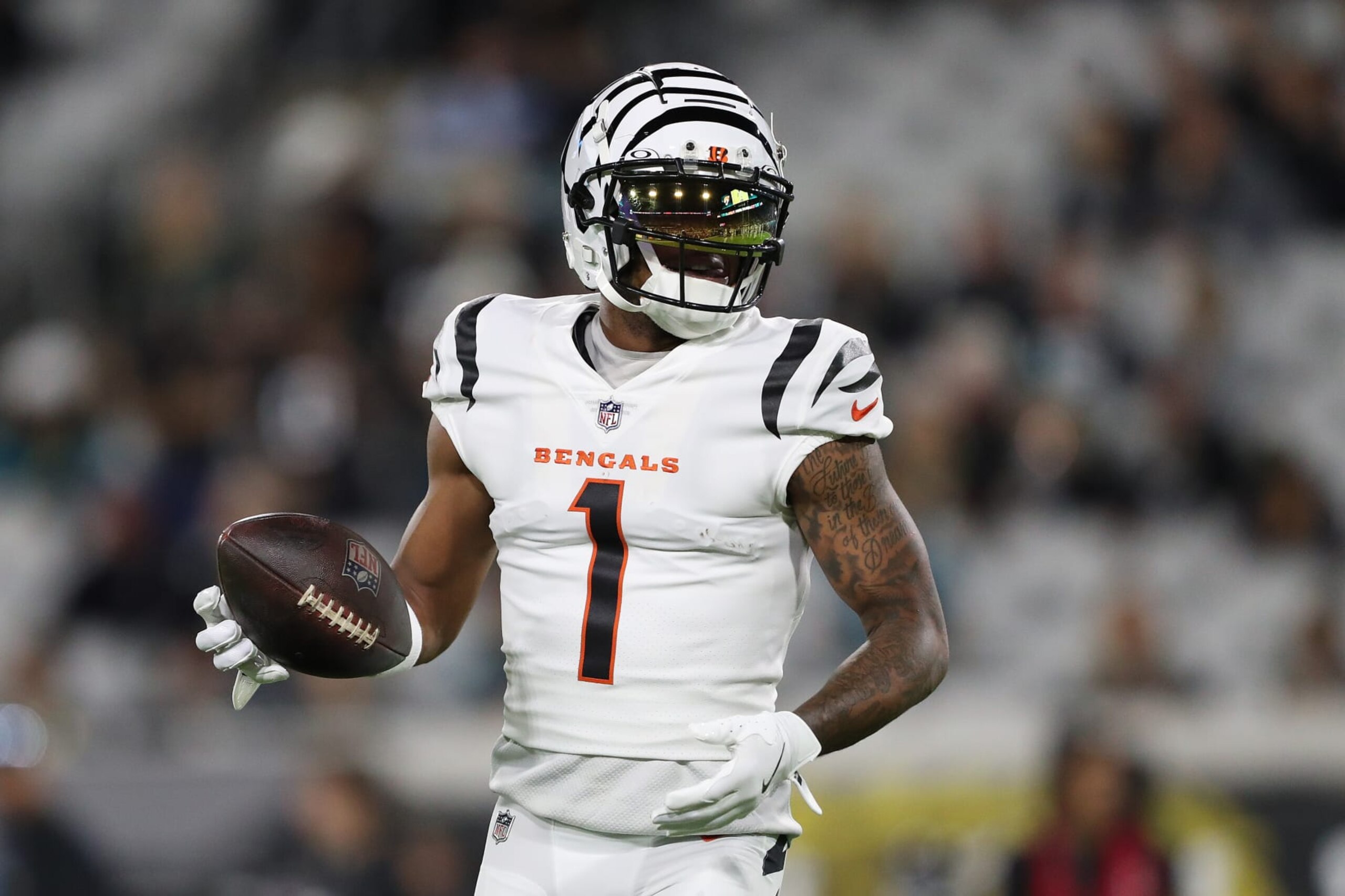 JACKSONVILLE, FLORIDA - DECEMBER 04: Ja'Marr Chase #1 of the Cincinnati Bengals looks on prior to the game against the Jacksonville Jaguars at EverBank Stadium on December 04, 2023 in Jacksonville, Florida. (Photo by Courtney Culbreath/Getty Images)