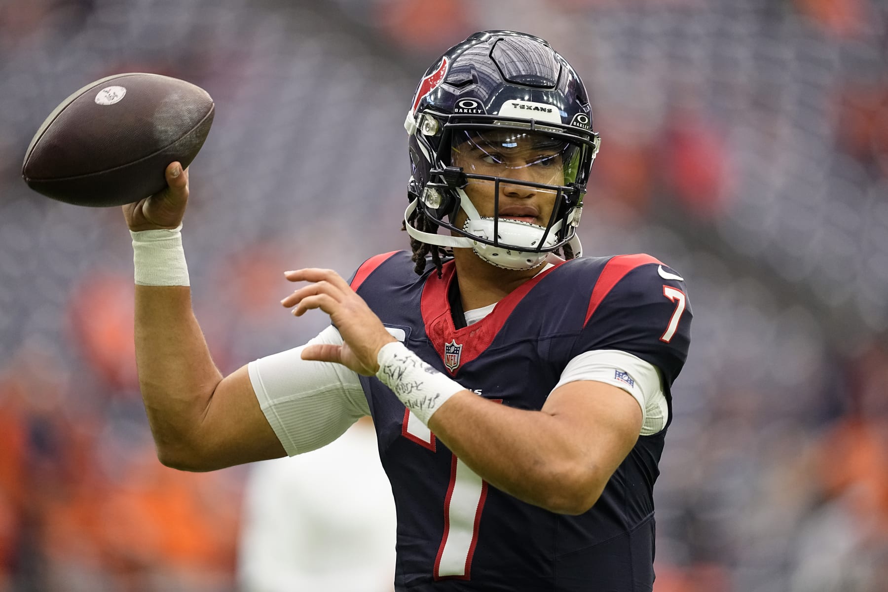 HOUSTON, TEXAS - DECEMBER 03: C.J. Stroud #7 of the Houston Texans warms up before the game against the Denver Broncos at NRG Stadium on December 03, 2023 in Houston, Texas. (Photo by Sam Hodde/Getty Images)
