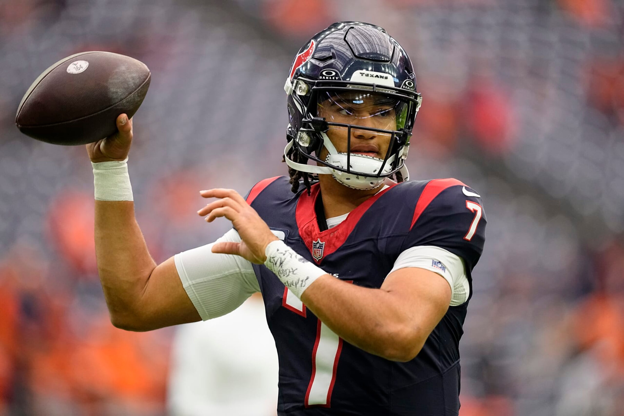 HOUSTON, TEXAS - DECEMBER 03: C.J. Stroud #7 of the Houston Texans warms up before the game against the Denver Broncos at NRG Stadium on December 03, 2023 in Houston, Texas. (Photo by Sam Hodde/Getty Images)
