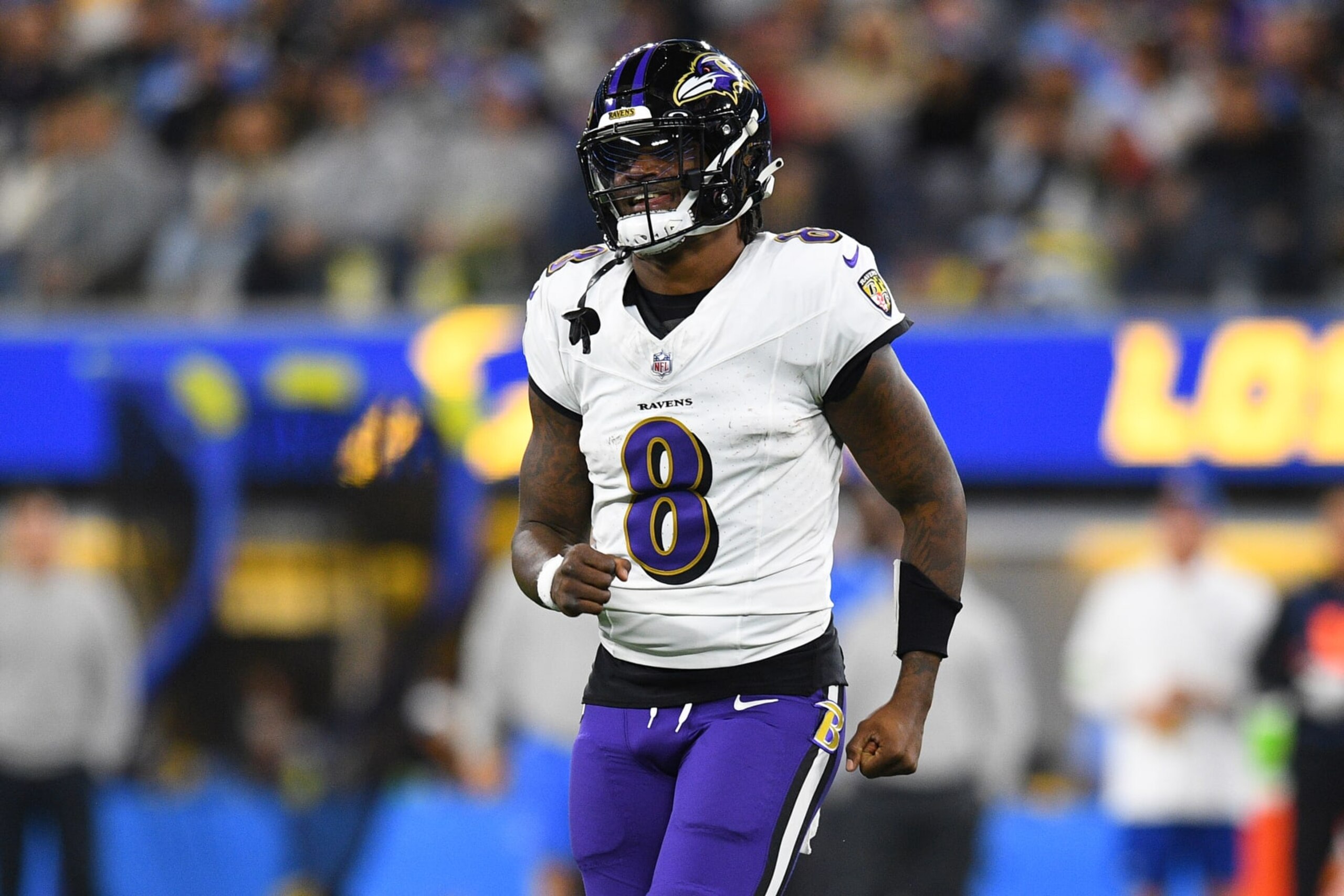 INGLEWOOD, CA - NOVEMBER 26: Baltimore Ravens quarterback Lamar Jackson (8) looks on during the NFL regular season game between the Baltimore Ravens and the Los Angeles Chargers on November 26, 2023, at SoFi Stadium in Inglewood, CA. (Photo by Brian Rothmuller/Icon Sportswire via Getty Images)