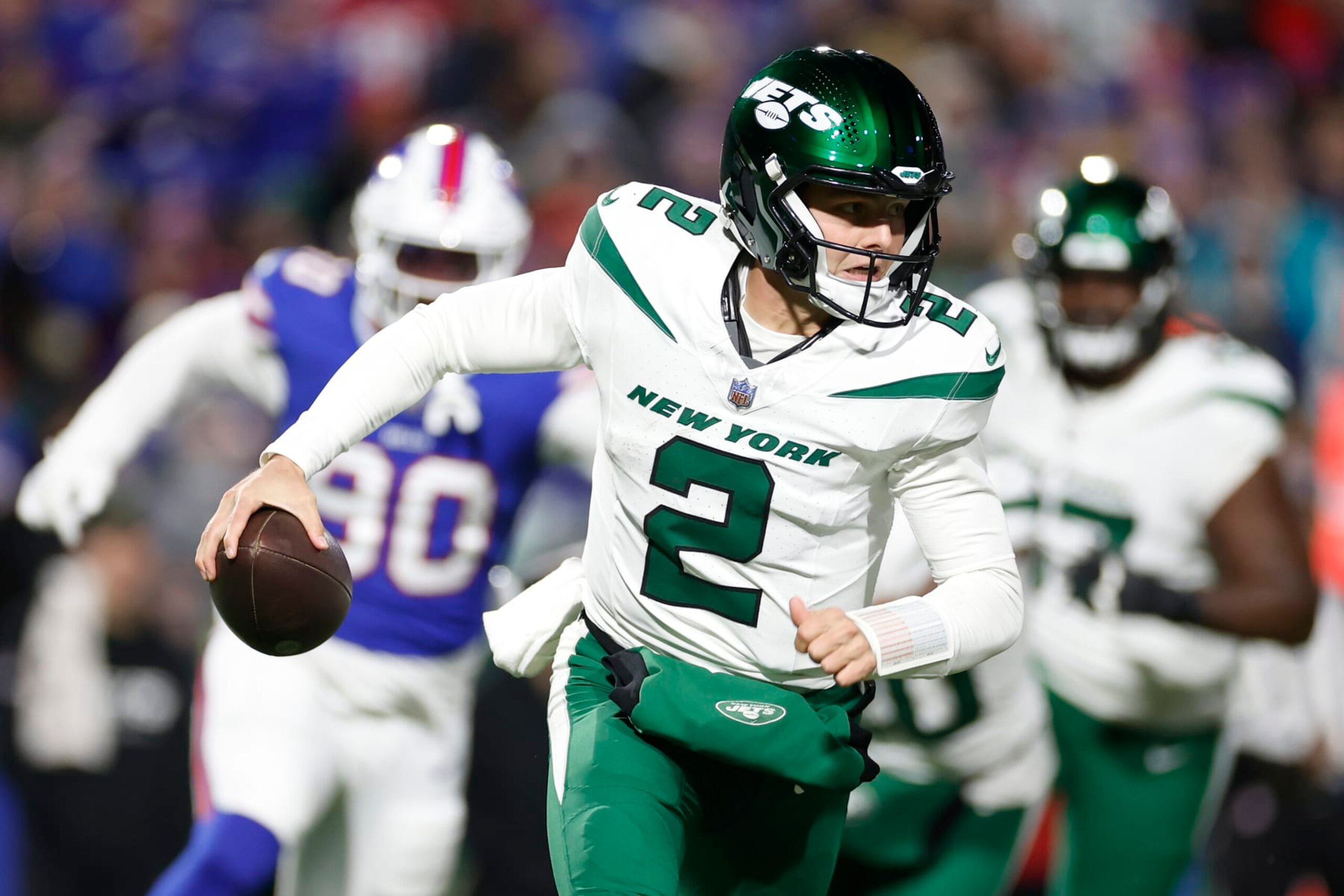 ORCHARD PARK, NEW YORK - NOVEMBER 19: Zach Wilson #2 of the New York Jets scrambles in the second quarter against the Buffalo Bills at Highmark Stadium on November 19, 2023 in Orchard Park, New York. (Photo by Sarah Stier/Getty Images) ORCHARD PARK, NEW YORK - NOVEMBER 19: Zach Wilson #2 of the New York Jets scrambles in the second quarter against the Buffalo Bills at Highmark Stadium on November 19, 2023 in Orchard Park, New York. (Photo by Sarah Stier/Getty Images)