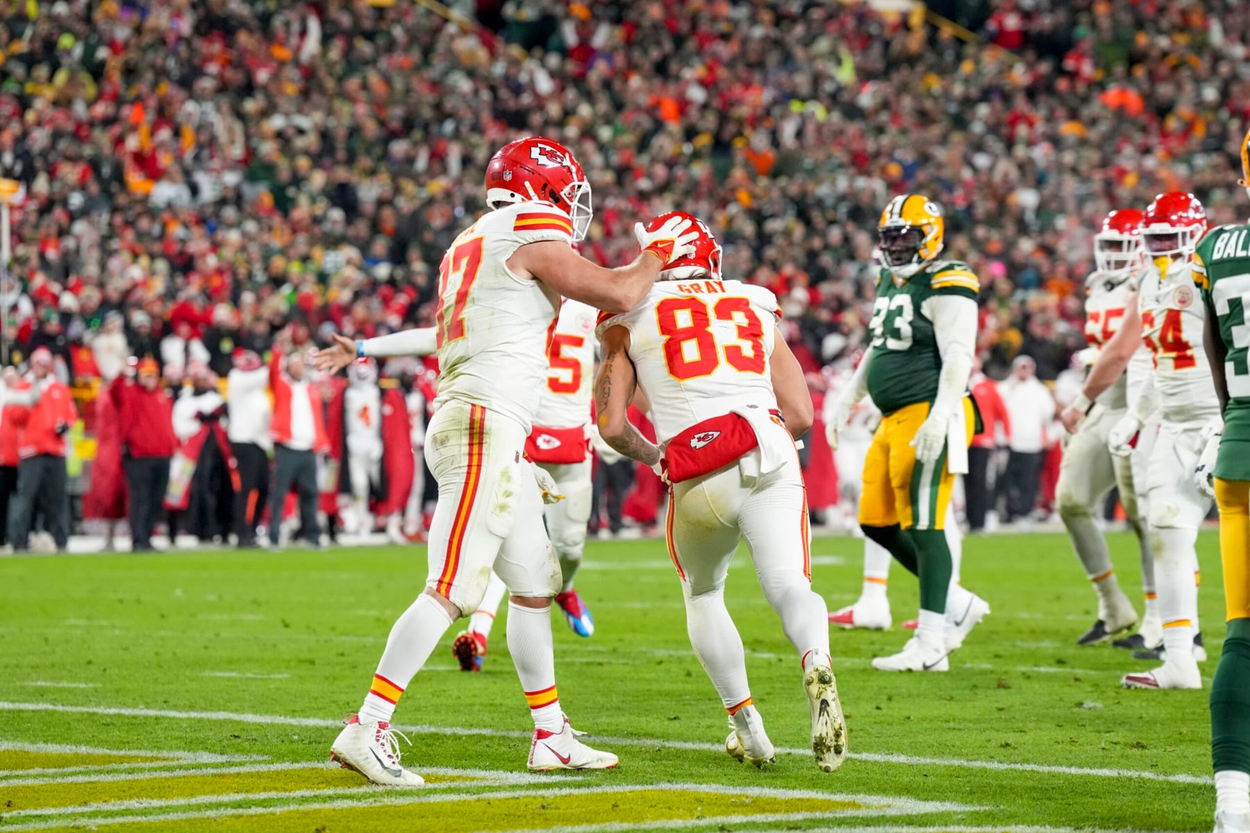 GREEN BAY, WI - DECEMBER 3: Tight end Noah Gray #83 and tight end Travis Kelce #87 of the Kansas City Chiefs celebrate a touch down during an NFL football game against the Green Bay Packers at Lambeau Field on December 3, 2023 in Green Bay, Wisconsin. (Photo by Todd Rosenberg/Getty Images)