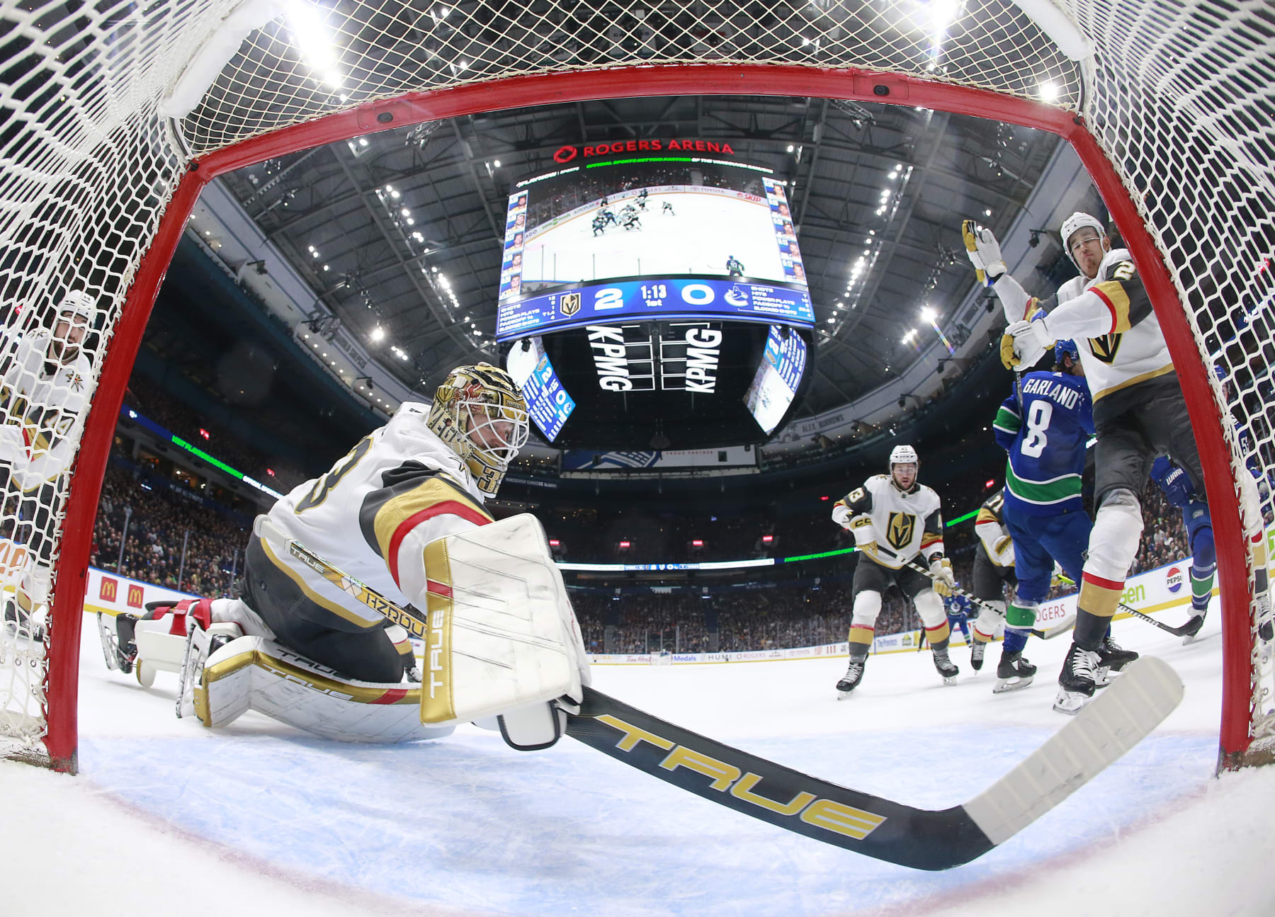 VANCOUVER, CANADA - NOVEMBER 30: Adin Hill #33 of the Vegas Golden Knights makes a save during the first period of their NHL game against the Vancouver Canucks at Rogers Arena on November 30, 2023 in Vancouver, British Columbia, Canada.  (Photo by Jeff Vinnick/NHLI via Getty Images)