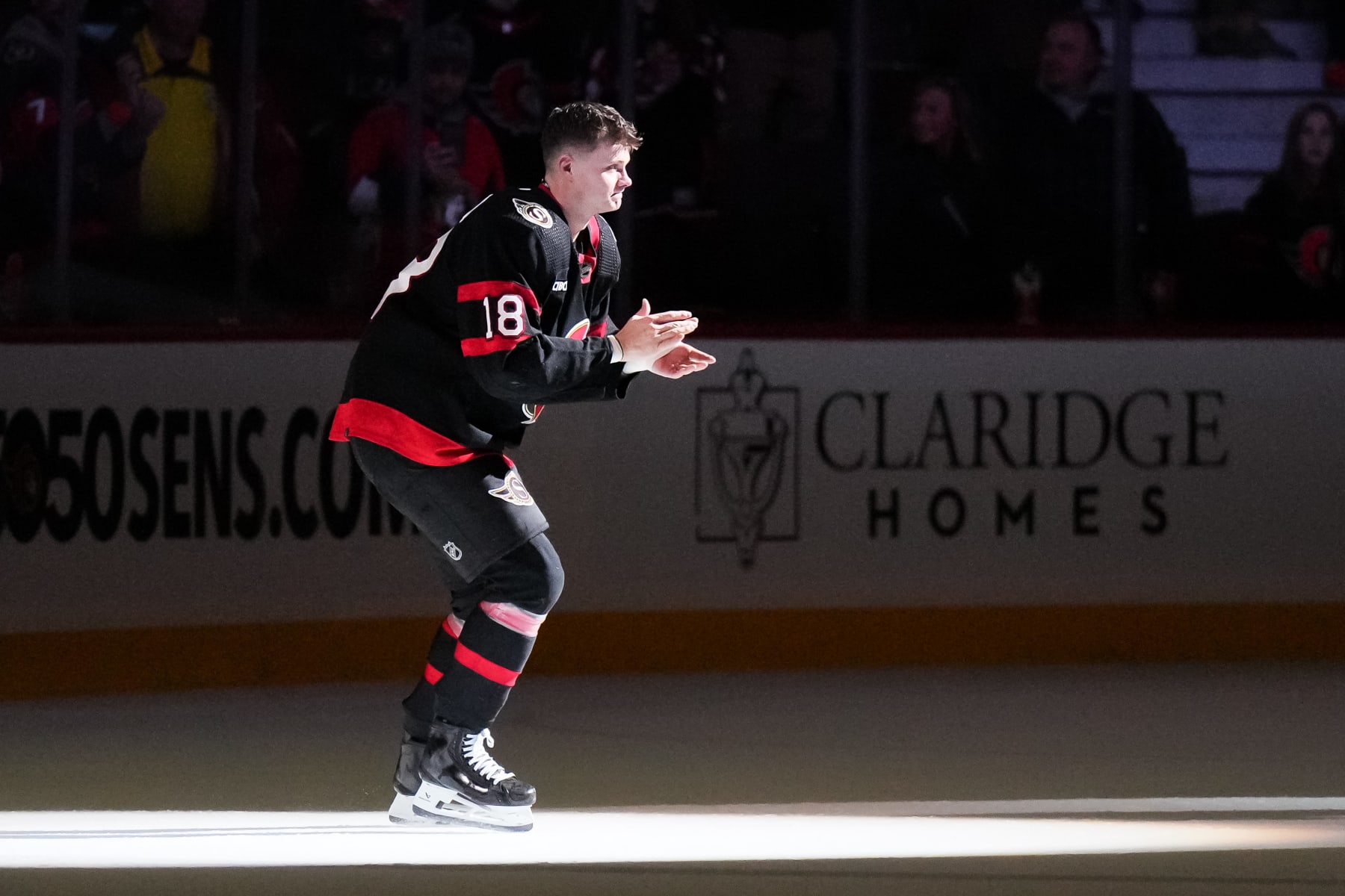 OTTAWA, CANADA - DECEMBER 2:  Tim Stützle #18 of the Ottawa Senators salutes the fans as he is named a star of the game after a win against the Seattle Kraken at Canadian Tire Centre on December 2, 2023 in Ottawa, Ontario, Canada.  (Photo by André Ringuette/NHLI via Getty Images)