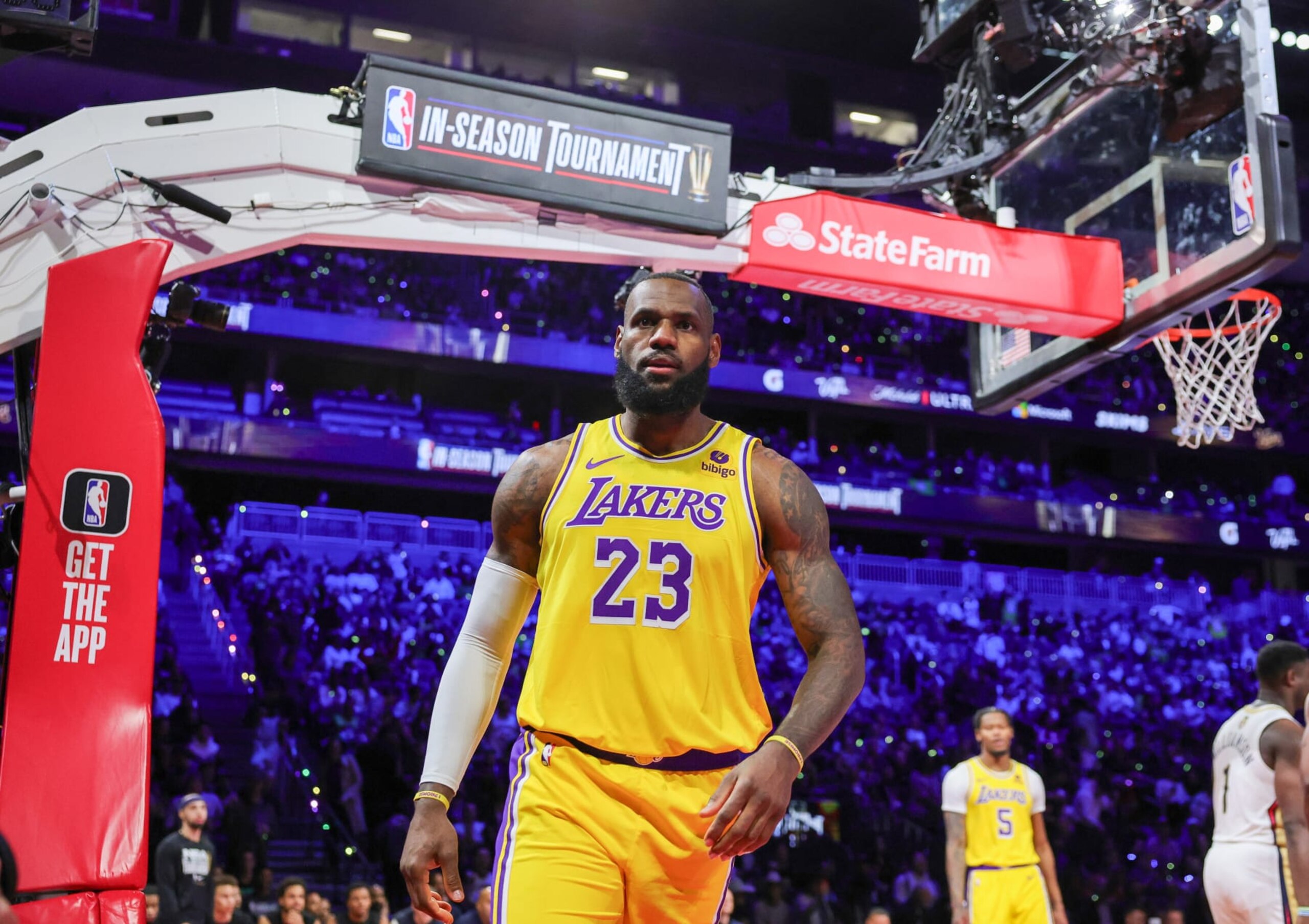 LAS VEGAS, NEVADA - DECEMBER 07: LeBron James #23 of the Los Angeles Lakers reacts after scoring and drawing a foul against the New Orleans Pelicans in the first half of the West semifinal game of the inaugural NBA In-Season Tournament at T-Mobile Arena on December 07, 2023 in Las Vegas, Nevada. The Lakers defeated the Pelicans 133-89. NOTE TO USER: User expressly acknowledges and agrees that, by downloading and or using this photograph, User is consenting to the terms and conditions of the Getty Images License Agreement.  (Photo by Ethan Miller/Getty Images)
