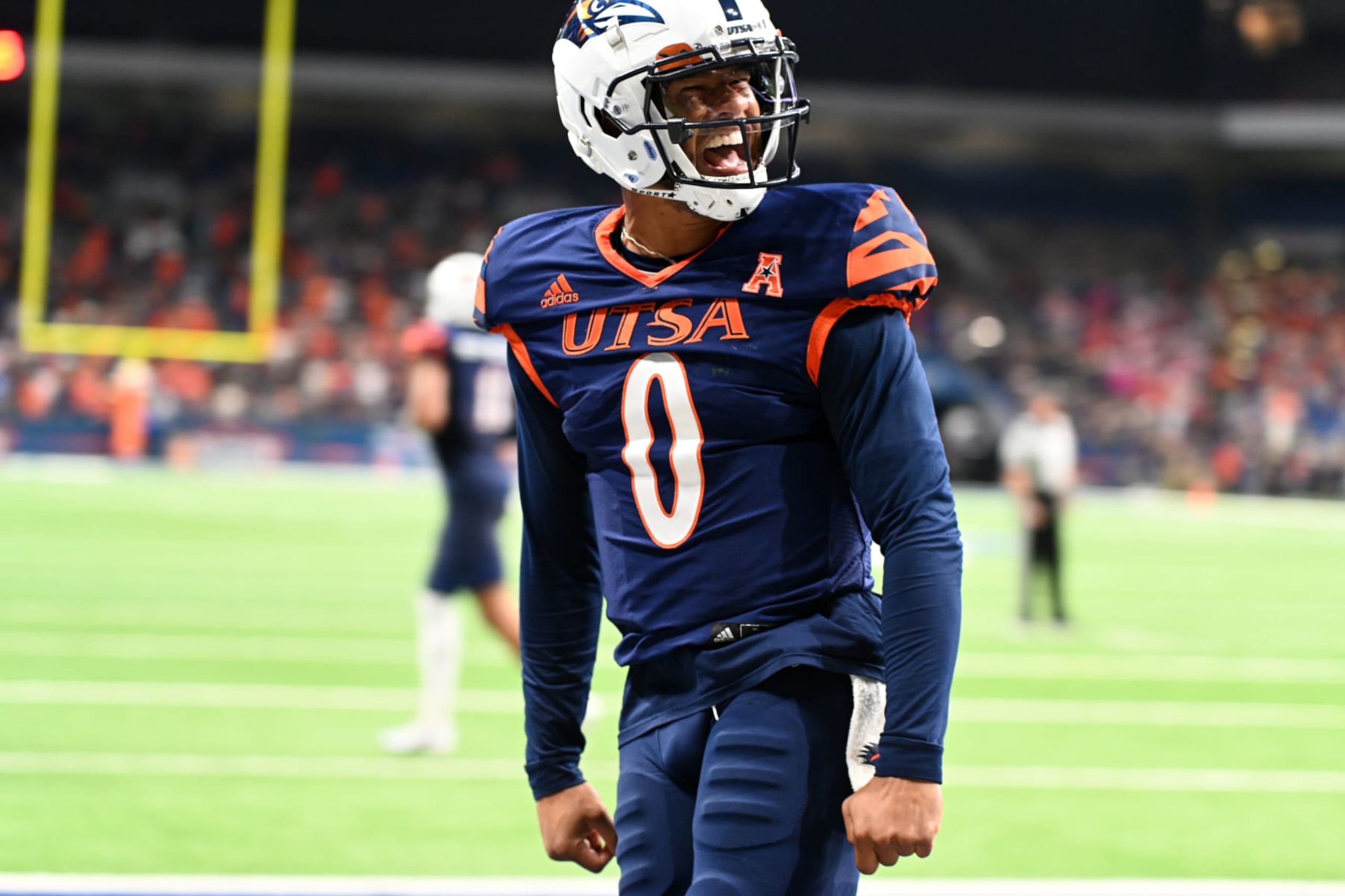 SAN ANTONIO, TX - NOVEMBER 17: University of Texas - San Antonio Roadrunners QB Frank Harris celebrates a touchdown during the game between the University of South Florida Bulls and the University of Texas - San Antonio Roadrunners on November 17, 2023 at the Alamodome in San Antonio, TX. (Photo by John Rivera/Icon Sportswire via Getty Images)