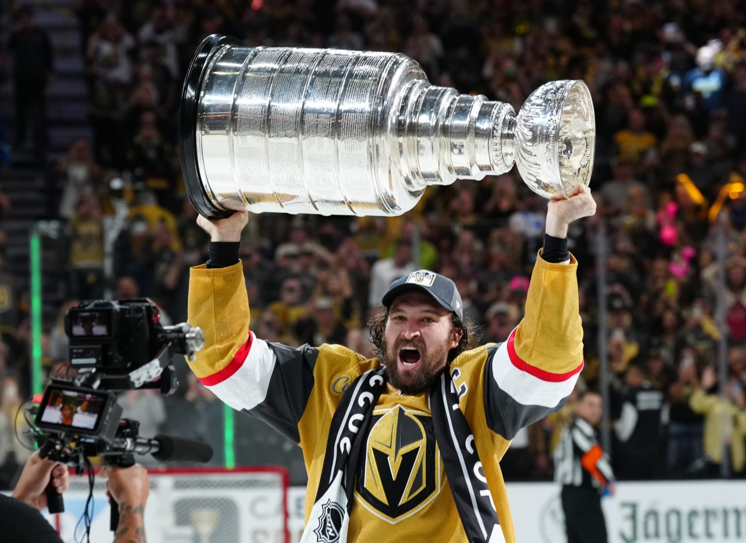 Vegas Golden Knights captain Mark Stone hoists the Stanley Cup.