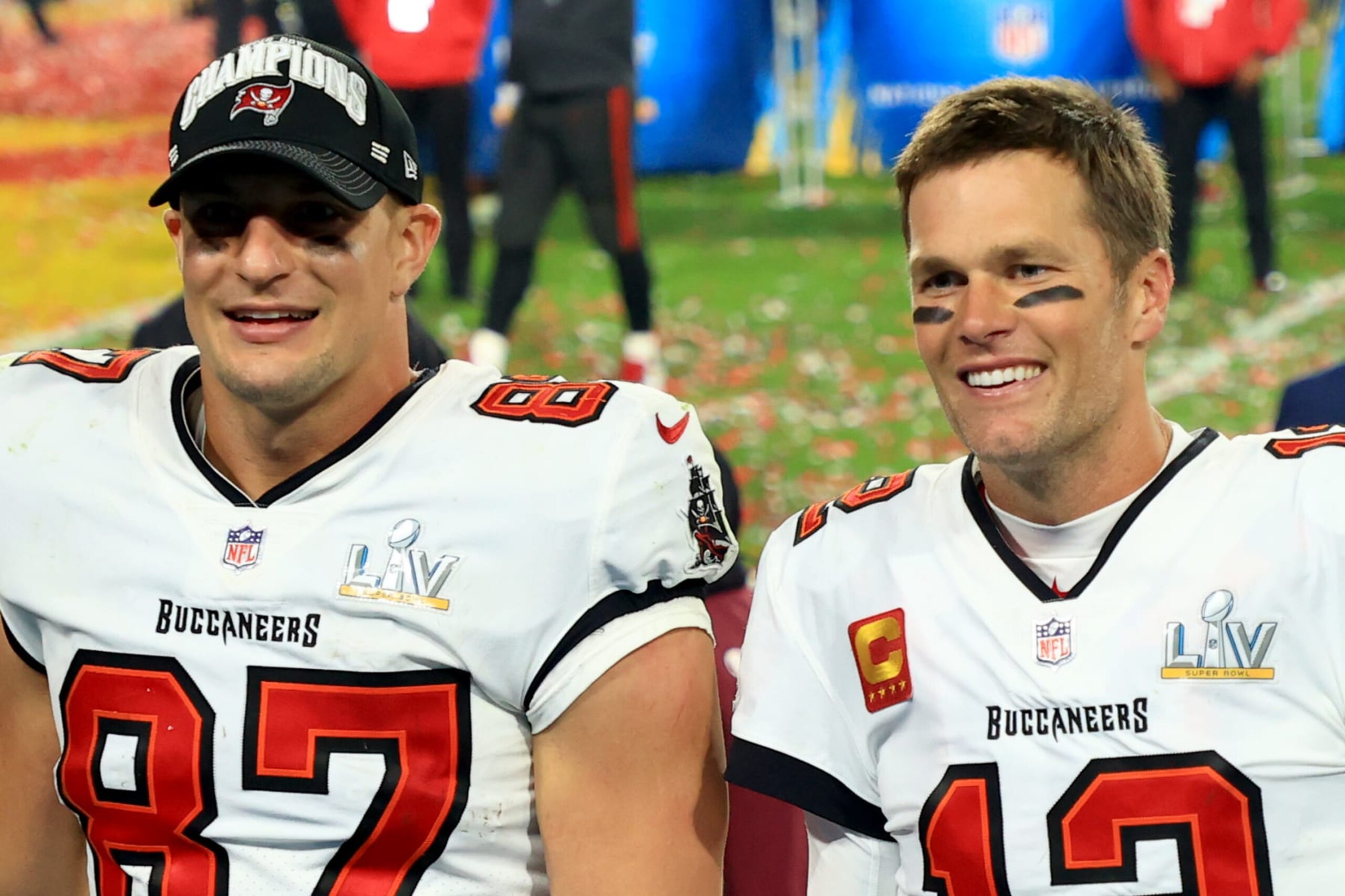 TAMPA, FLORIDA - FEBRUARY 07: Rob Gronkowski #87 and Tom Brady #12 of the Tampa Bay Buccaneers celebrate after defeating the Kansas City Chiefs in Super Bowl LV at Raymond James Stadium on February 07, 2021 in Tampa, Florida. The Buccaneers defeated the Chiefs 31-9. (Photo by Mike Ehrmann/Getty Images)