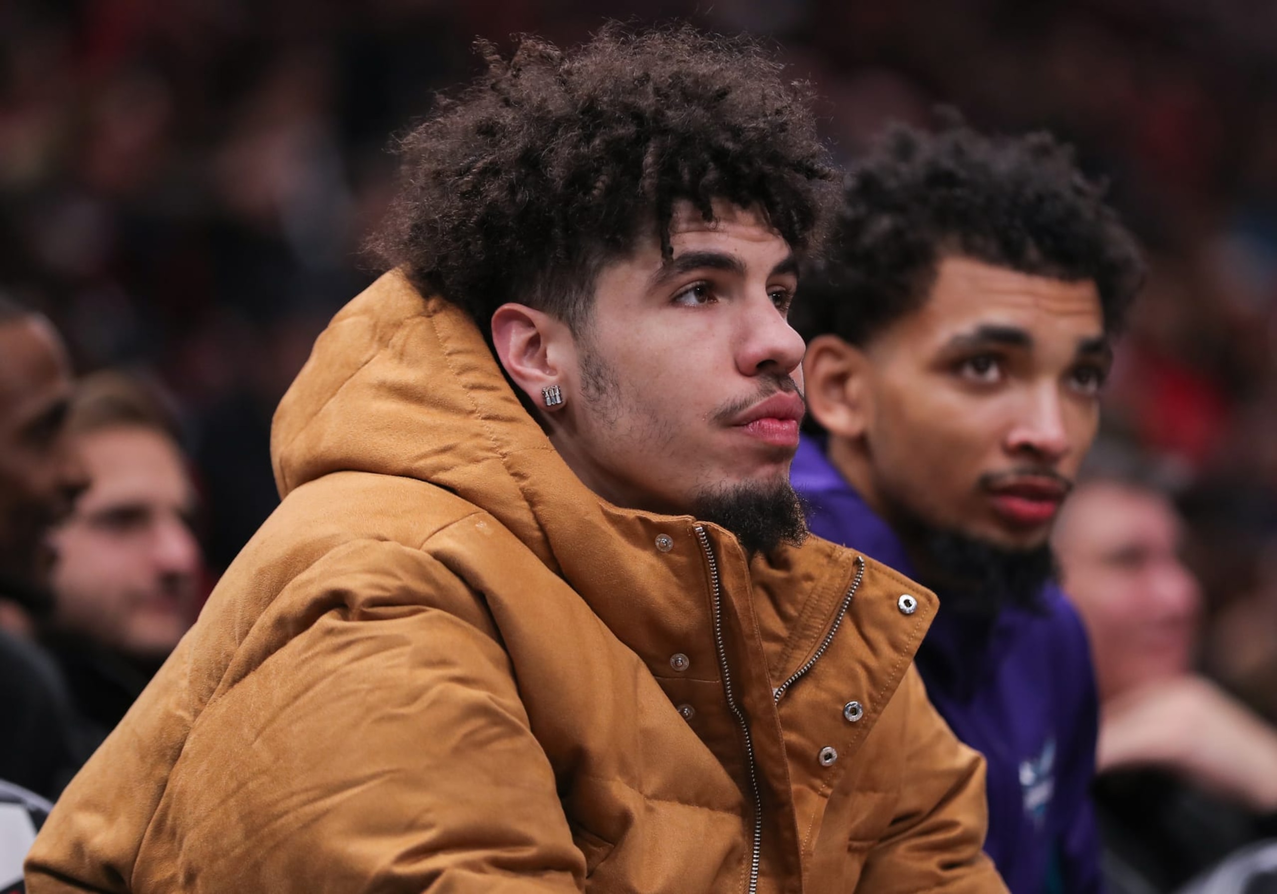 CHICAGO, IL - DECEMBER 06: LaMelo Ball #1 of the Charlotte Hornets looks on from the bench during the first half against Chicago Bulls at the United Center on December 6, 2023 in Chicago, Illinois. (Photo by Melissa Tamez/Icon Sportswire via Getty Images)