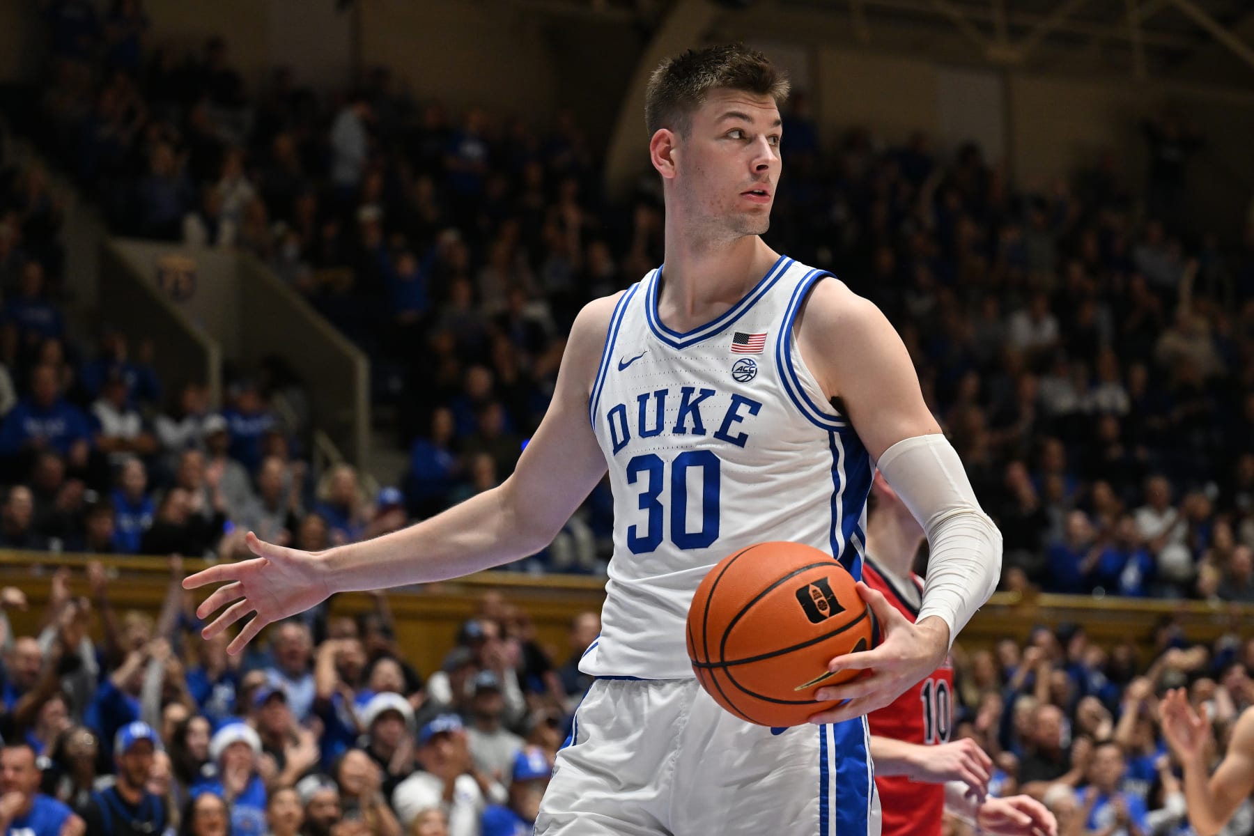 DURHAM, NORTH CAROLINA - NOVEMBER 24: Kyle Filipowski #30 of the Duke Blue Devils reacts during the game against the Southern Indiana Screaming Eagles at Cameron Indoor Stadium on November 24, 2023 in Durham, North Carolina. Duke won 80-62. (Photo by Grant Halverson/Getty Images)