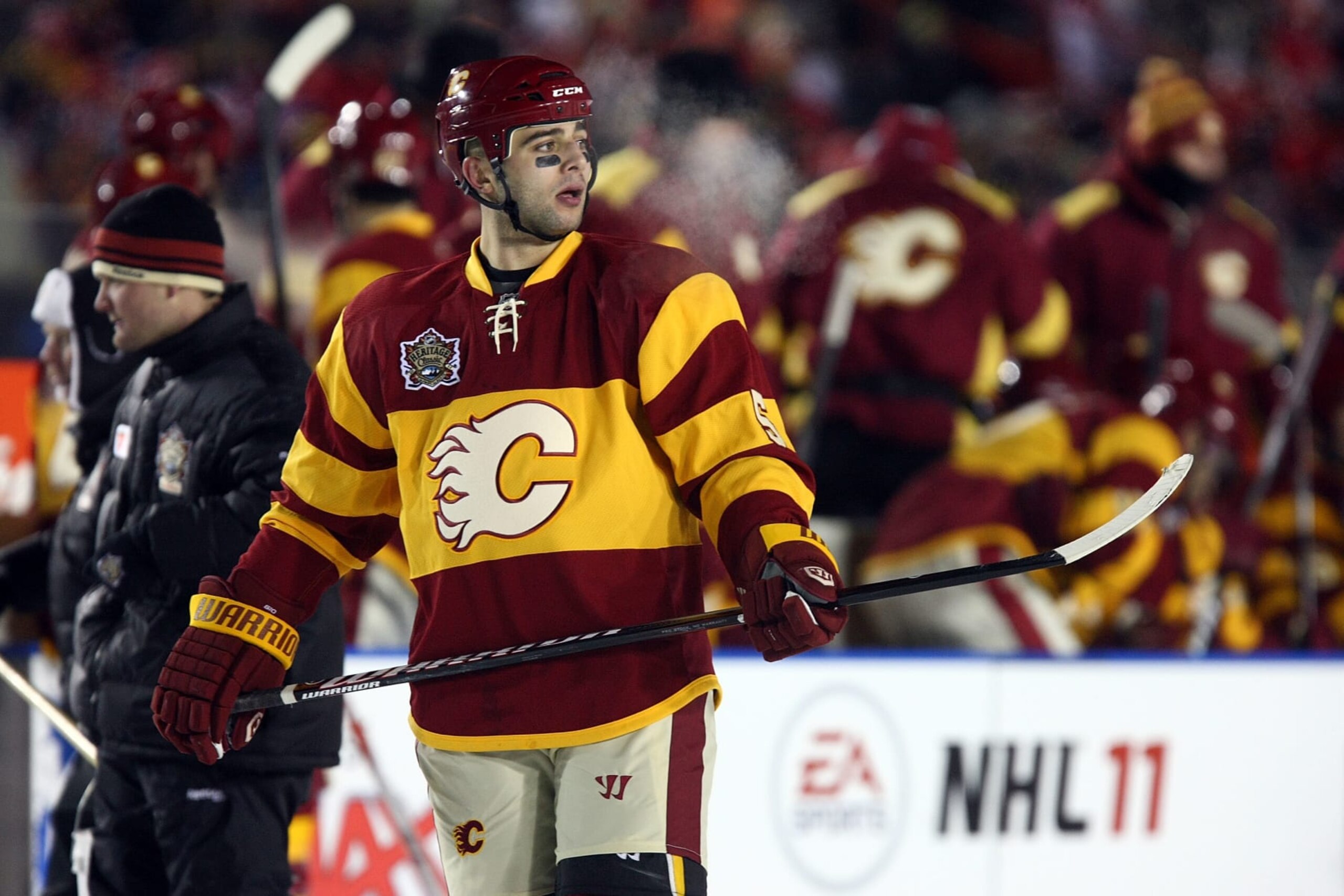 CALGARY, AB - FEBRUARY 20:  Mark Giordano #5 of the Calgary Flames looks on against the Montreal Canadiens during the 2011 NHL Tim Hortons Heritage Classic at McMahon Stadium on February 20, 2011 in Calgary, Alberta, Canada.  (Photo by Dave Sandford/NHLI via Getty Images)
