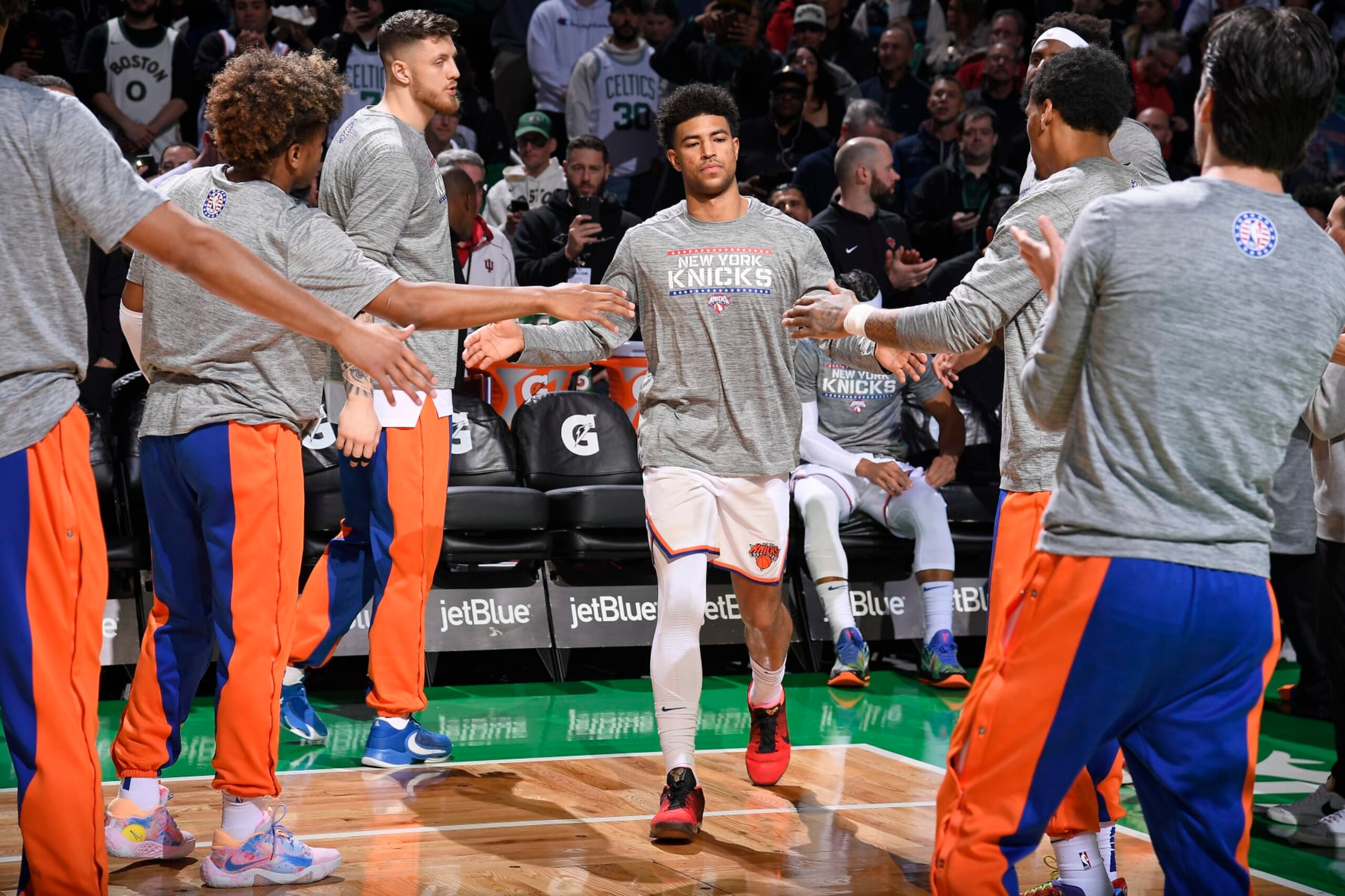 BOSTON, MA - NOVEMBER 13: Quentin Grimes #6 of the New York Knicks high fives teammates before the game against the Boston Celtics on November 13, 2023 at the TD Garden in Boston, Massachusetts. NOTE TO USER: User expressly acknowledges and agrees that, by downloading and or using this photograph, User is consenting to the terms and conditions of the Getty Images License Agreement. Mandatory Copyright Notice: Copyright 2023 NBAE  (Photo by Brian Babineau/NBAE via Getty Images)