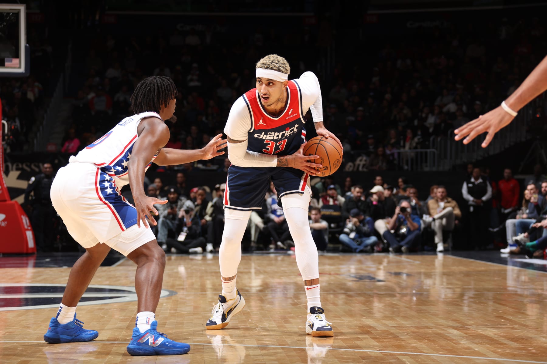 WASHINGTON, DC -  DECEMBER 6: Kyle Kuzma #33 of the Washington Wizards handles the ball during the game against the Philadelphia 76ers on December 6, 2023 at Capital One Arena in Washington, DC. NOTE TO USER: User expressly acknowledges and agrees that, by downloading and or using this Photograph, user is consenting to the terms and conditions of the Getty Images License Agreement. Mandatory Copyright Notice: Copyright 2023 NBAE (Photo by Stephen Gosling/NBAE via Getty Images)