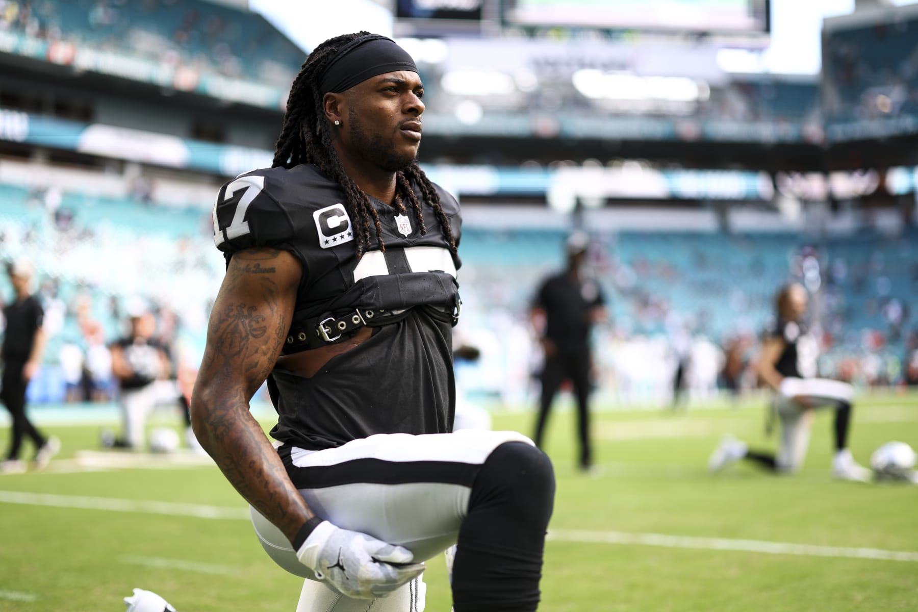MIAMI GARDENS, FL - NOVEMBER 19: Davante Adams #17 of the Las Vegas Raiders stretches prior to an NFL football game against the Miami Dolphins at Hard Rock Stadium on November 19, 2023 in Miami Gardens, Florida. (Photo by Kevin Sabitus/Getty Images)