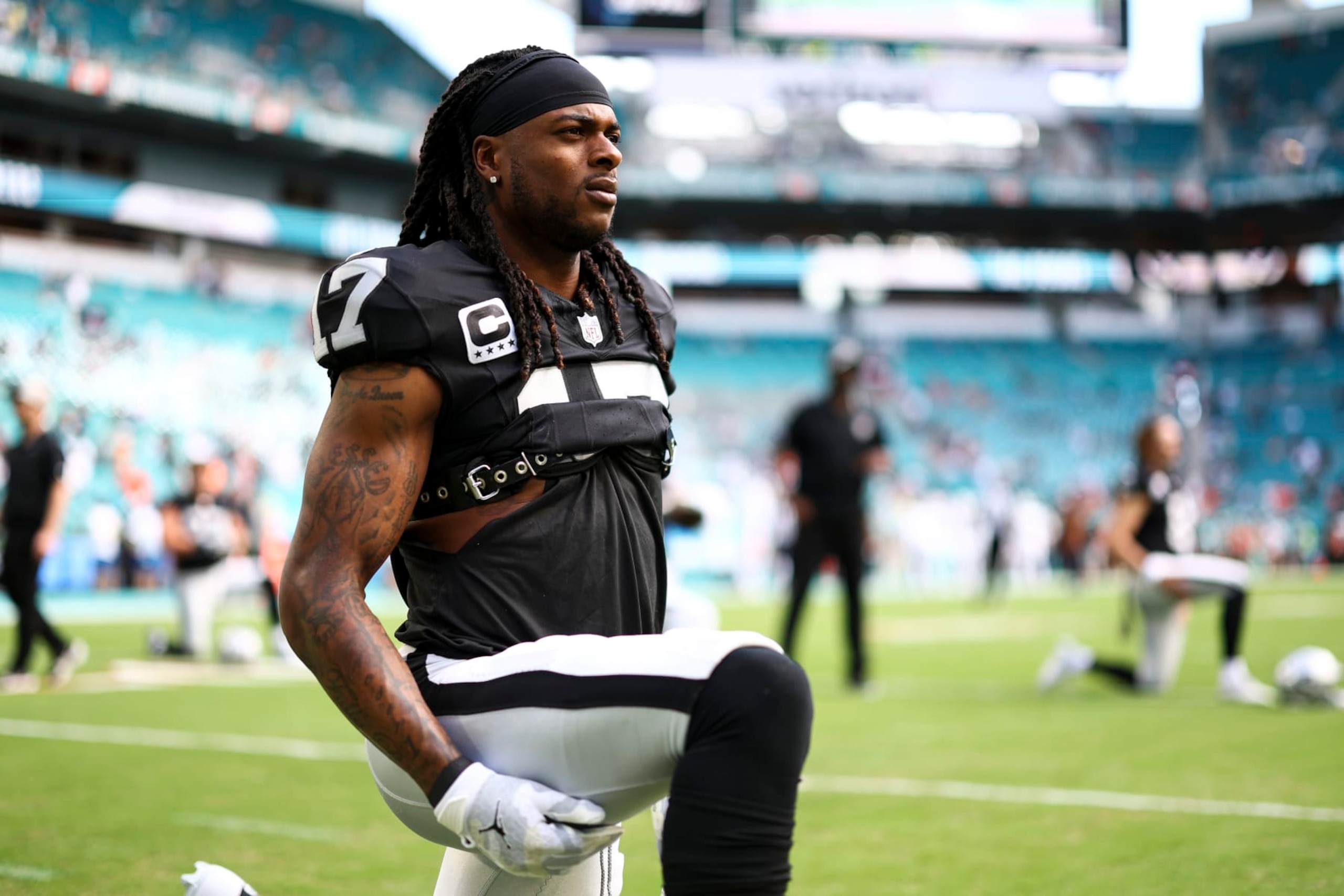 MIAMI GARDENS, FL - NOVEMBER 19: Davante Adams #17 of the Las Vegas Raiders stretches prior to an NFL football game against the Miami Dolphins at Hard Rock Stadium on November 19, 2023 in Miami Gardens, Florida. (Photo by Kevin Sabitus/Getty Images)