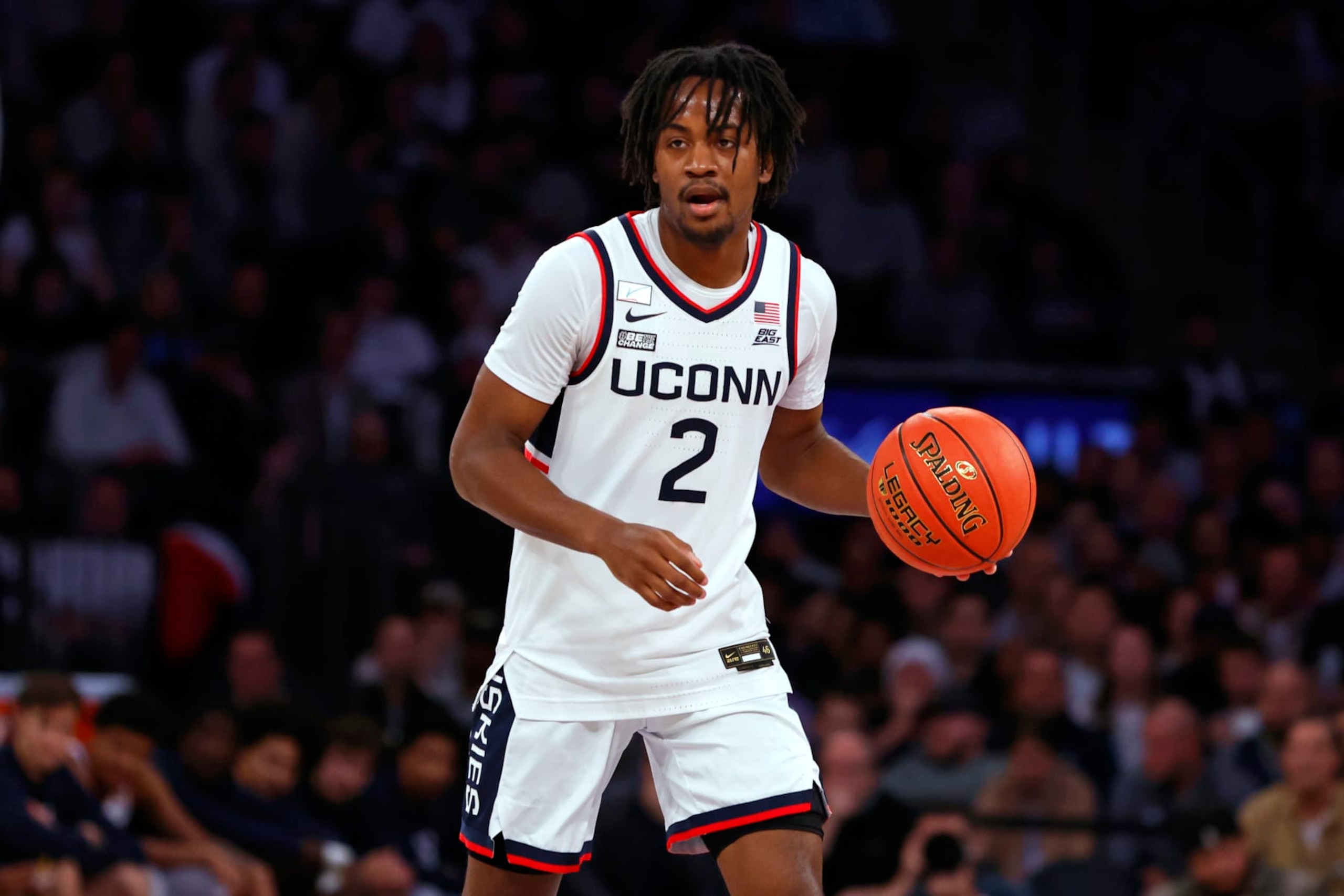 NEW YORK, NEW YORK - DECEMBER 5: Tristen Newton #2 of the Connecticut Huskies in action against the North Carolina Tar Heels during a game in the Jimmy V Classic at Madison Square Garden on December 5, 2023 in New York City. Connecticut defeated North Carolina 87-76. (Photo by Rich Schultz/Getty Images)
