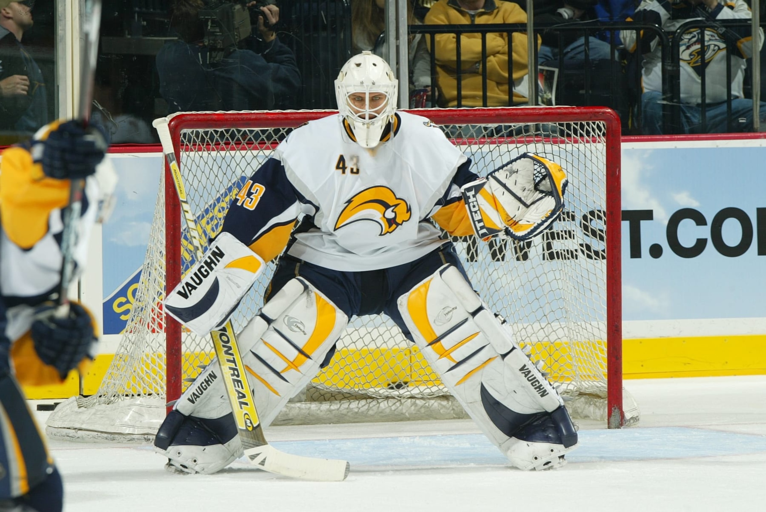NASHVILLE, TN - DECEMBER 21: Martin Biron #43 of the Buffalo Sabres eyes the puck against the Nashville Predators at Gaylord Entertainment Center on December 21, 2006 in Nashville, Tennessee.  (Photo by John A Russell/Getty Images)