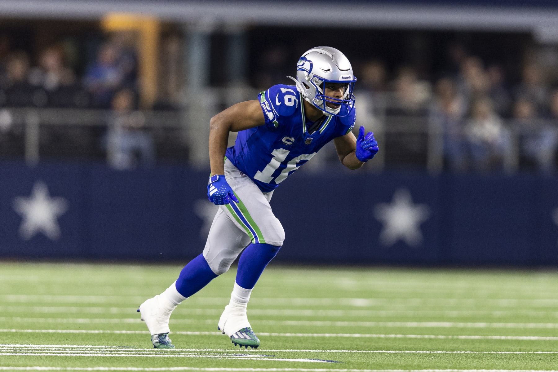 ARLINGTON, TEXAS - NOVEMBER 30: Tyler Lockett #16 of the Seattle Seahawks runs a route during an NFL football game between the Dallas Cowboys and the Seattle Seahawks at AT&T Stadium on November 30, 2023 in Arlington, Texas. (Photo by Michael Owens/Getty Images)