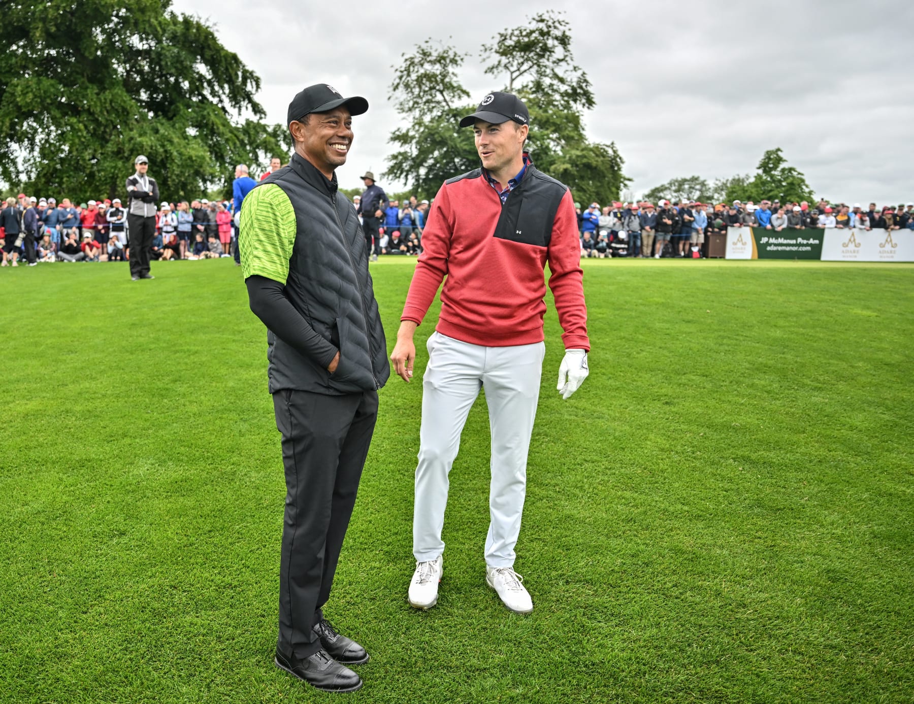 Limerick , Ireland - 4 July 2022; Jordan Speith of USA speaking to Tiger Woods of USA during day one of the JP McManus Pro-Am at Adare Manor Golf Club in Adare, Limerick. (Photo By Eóin Noonan/Sportsfile via Getty Images)
