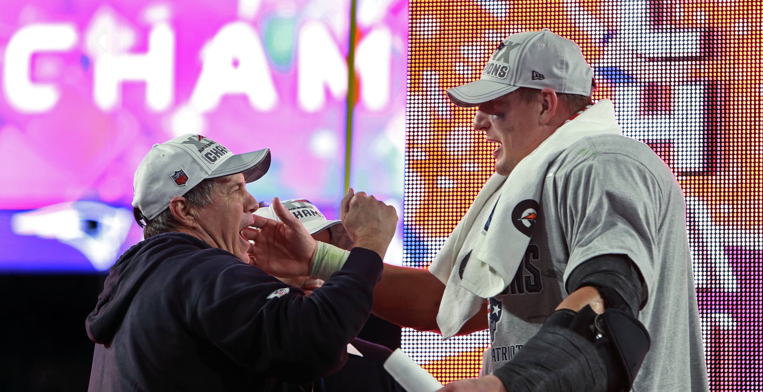 SCOTTSDALE, AZ - FEBRUARY 1: Patriots tight end Rob Gronkowski, right, celebrates New England's victory with head coach Bill Belichick, left,. The Seattle Seahawks played the New England Patriots in Super Bowl XLIX at the University of Phoenix Stadium. (Photo by Jim Davis/The Boston Globe via Getty Images)