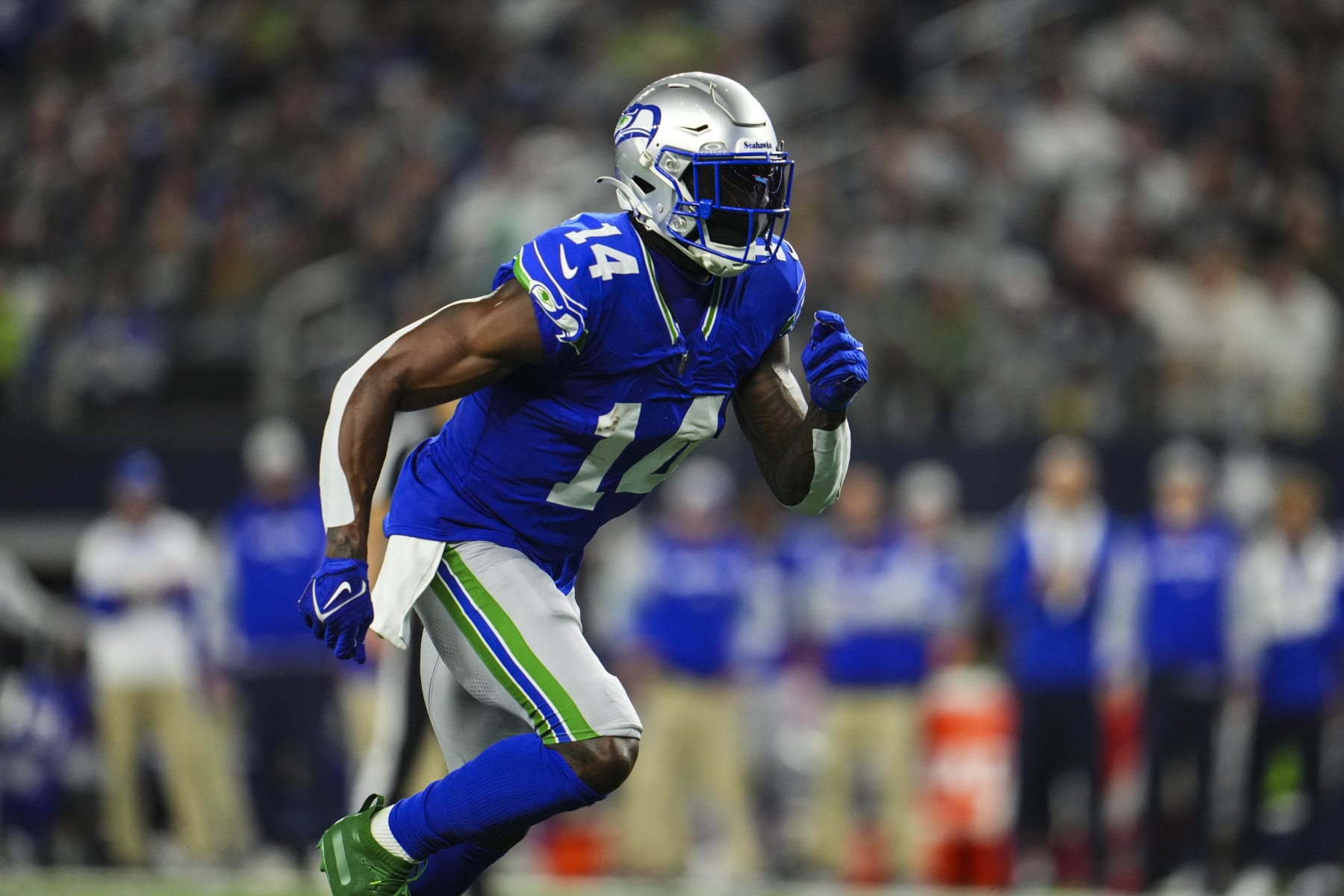 ARLINGTON, TX - NOVEMBER 30: DK Metcalf #14 of the Seattle Seahawks runs a route during an NFL football game against the Dallas Cowboys at AT&T Stadium on November 30, 2023 in Arlington, Texas. (Photo by Cooper Neill/Getty Images)