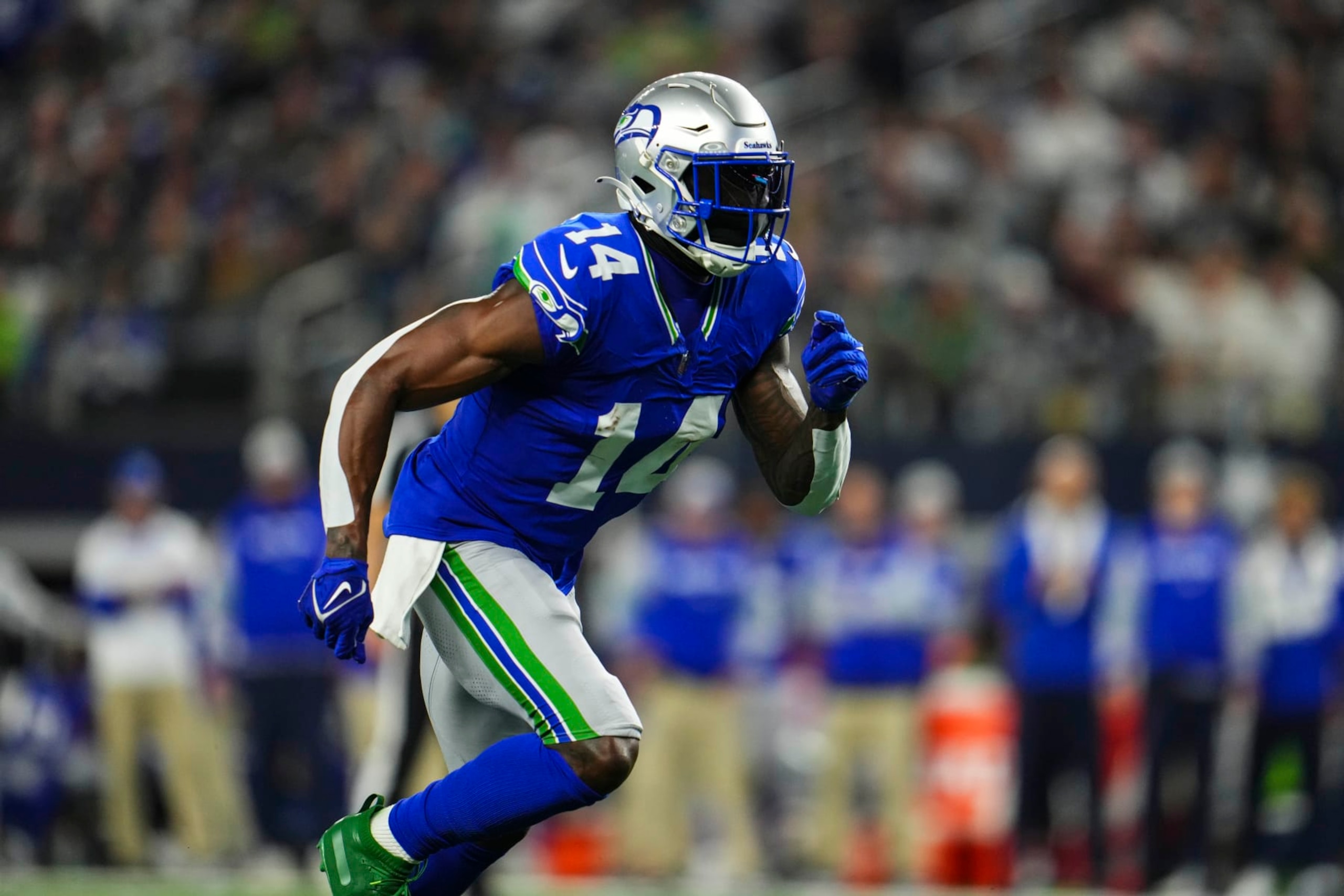 ARLINGTON, TX - NOVEMBER 30: DK Metcalf #14 of the Seattle Seahawks runs a route during an NFL football game against the Dallas Cowboys at AT&T Stadium on November 30, 2023 in Arlington, Texas. (Photo by Cooper Neill/Getty Images)