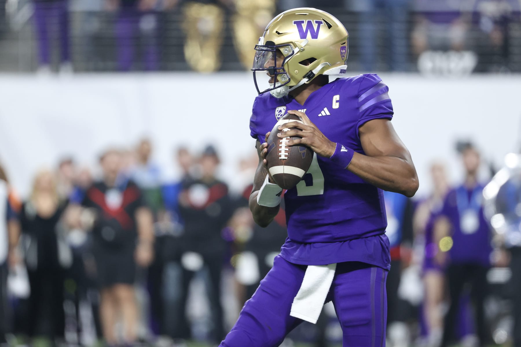 LAS VEGAS, NEVADA - DECEMBER 01: Michael Penix Jr. #9 of the Washington Huskies attempts a pass during the fourth quarter against the Oregon Ducks during the Pac-12 Championship at Allegiant Stadium on December 01, 2023 in Las Vegas, Nevada. (Photo by Ian Maule/Getty Images)