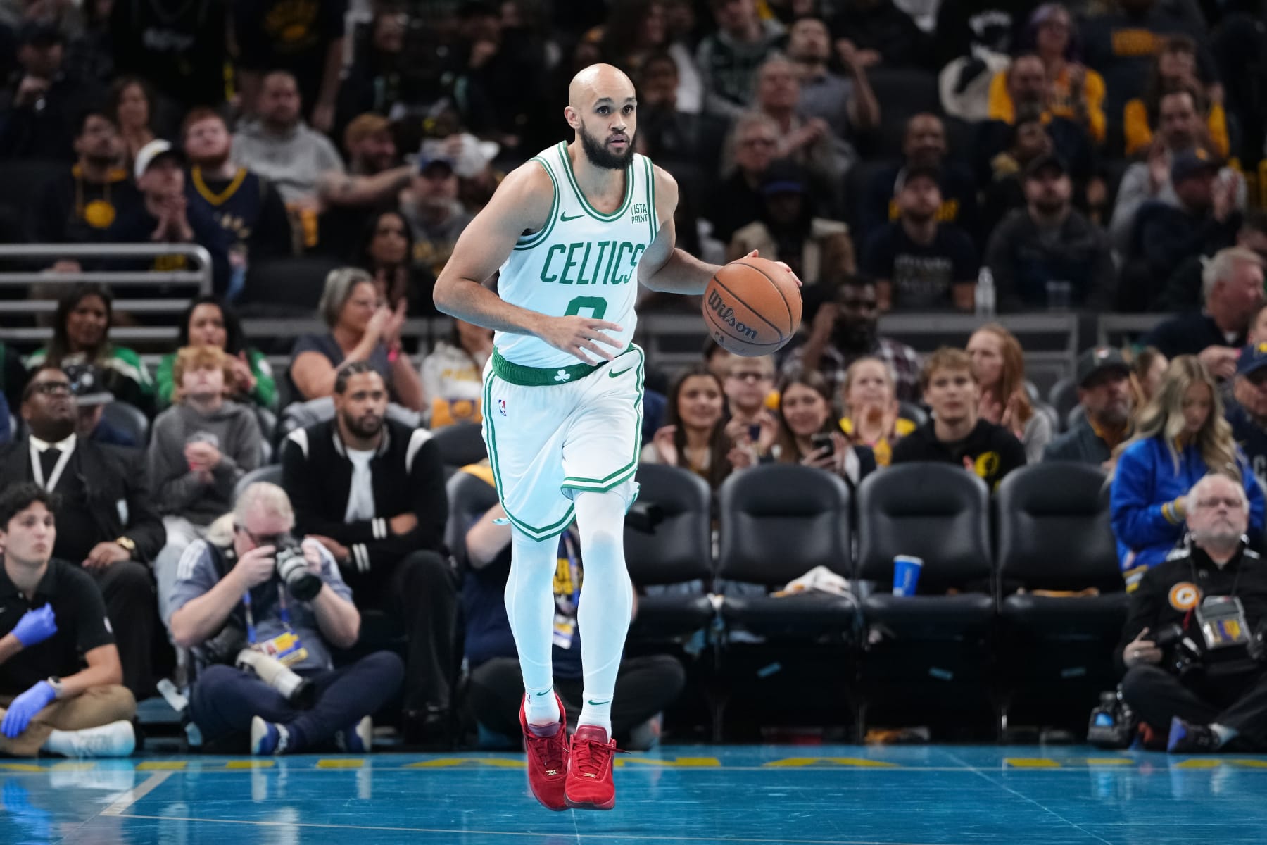 INDIANAPOLIS, INDIANA - DECEMBER 04: Derrick White #9 of the Boston Celtics dribbles the ball in the third quarter against the Indiana Pacers during the NBA In-Season Tournament at Gainbridge Fieldhouse on December 04, 2023 in Indianapolis, Indiana. NOTE TO USER: User expressly acknowledges and agrees that, by downloading and or using this photograph, User is consenting to the terms and conditions of the Getty Images License Agreement. (Photo by Dylan Buell/Getty Images)