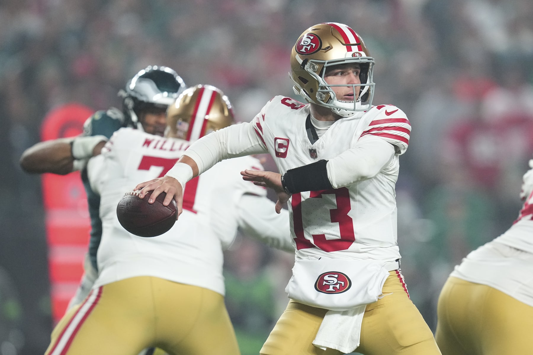PHILADELPHIA, PENNSYLVANIA - DECEMBER 3: Brock Purdy #13 of the San Francisco 49ers passes the ball against the Philadelphia Eagles at Lincoln Financial Field on December 3, 2023 in Philadelphia, Pennsylvania. (Photo by Mitchell Leff/Getty Images)