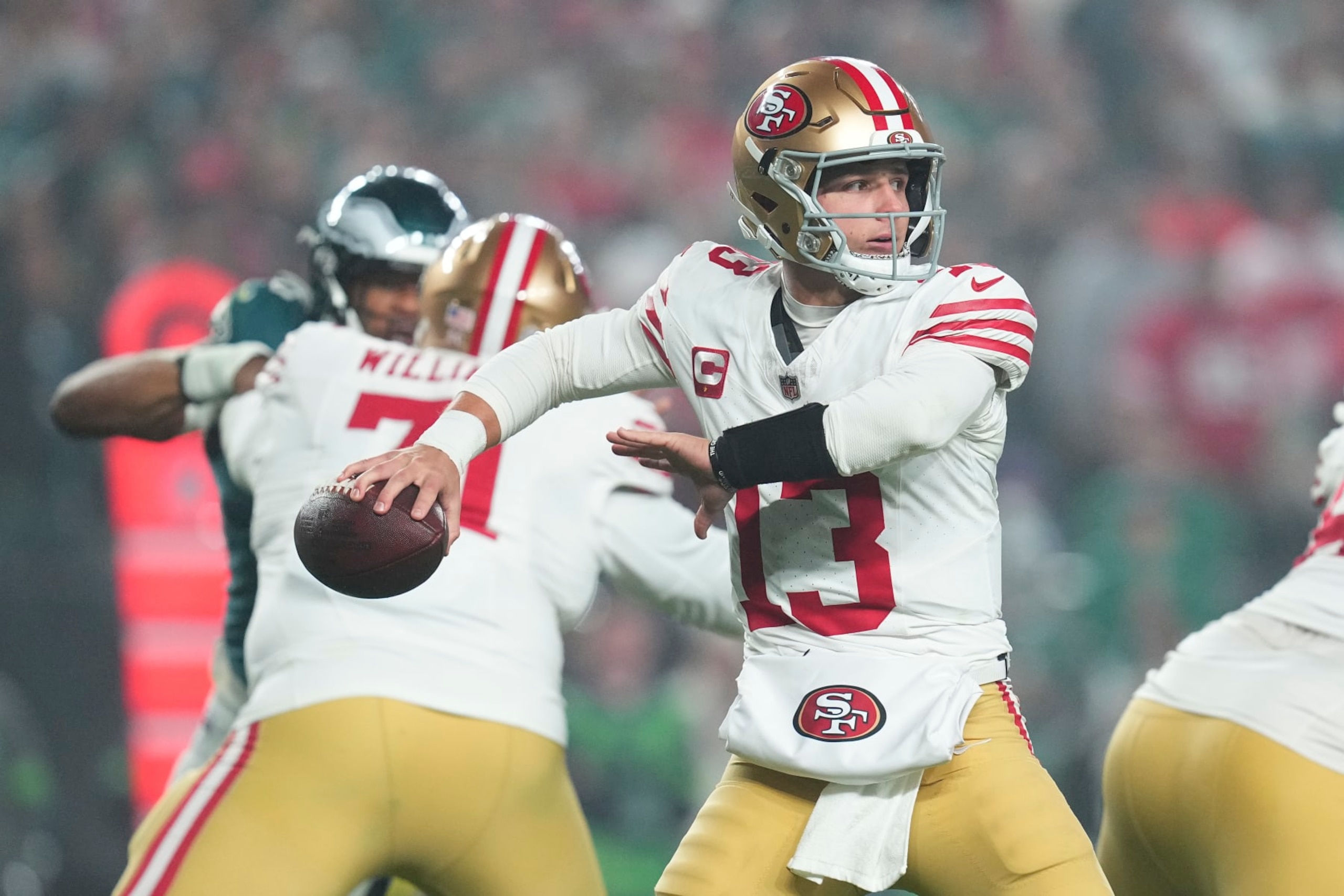 PHILADELPHIA, PENNSYLVANIA - DECEMBER 3: Brock Purdy #13 of the San Francisco 49ers passes the ball against the Philadelphia Eagles at Lincoln Financial Field on December 3, 2023 in Philadelphia, Pennsylvania. (Photo by Mitchell Leff/Getty Images)