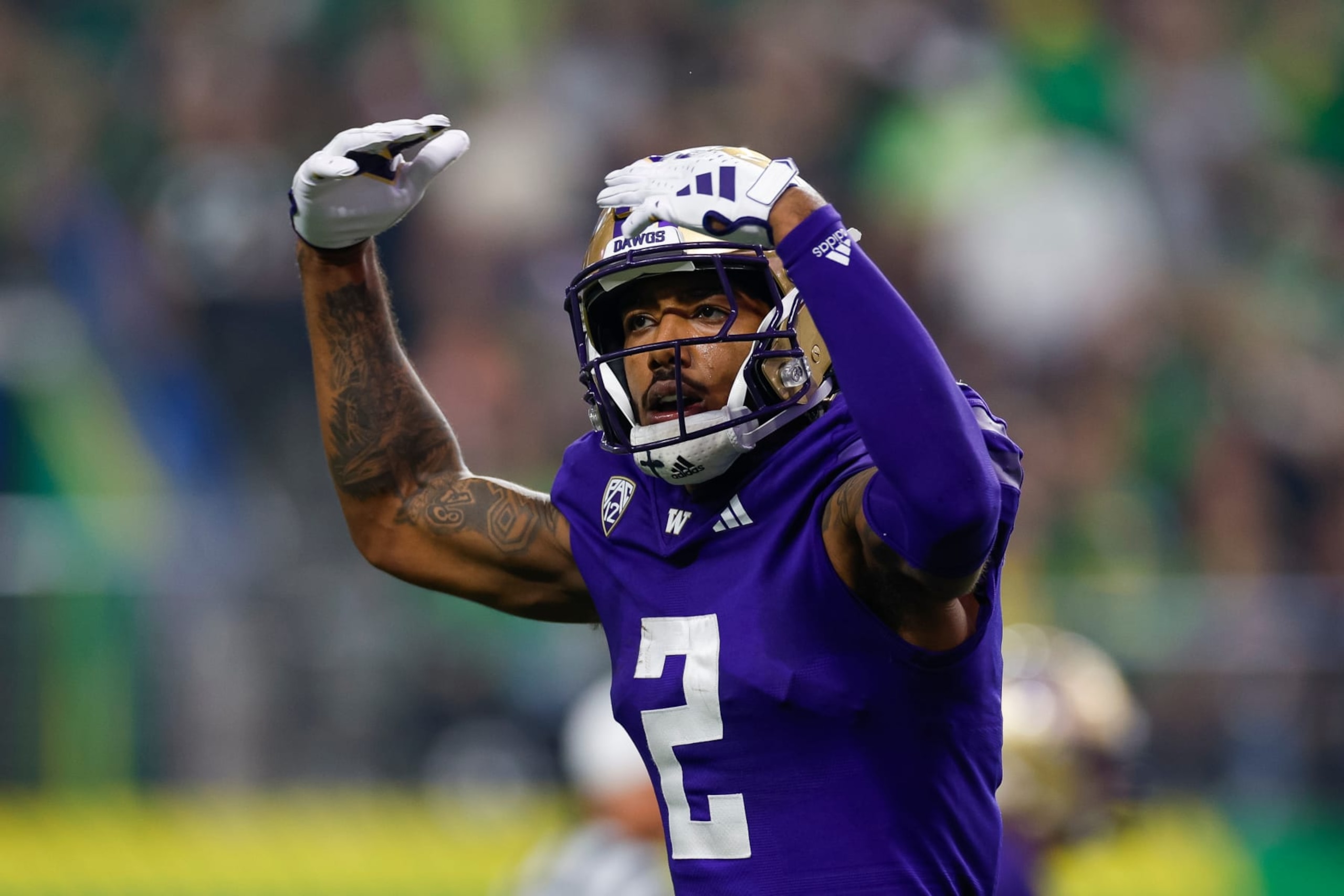 LAS VEGAS, NEVADA - DECEMBER 1: Ja'Lynn Polk #2 of the Washington Huskies reacts during the Pac-12 Championship game against the Oregon Ducks at Allegiant Stadium on December 1, 2023 in Las Vegas, Nevada. (Photo by Brandon Sloter/Image Of Sport/Getty Images)