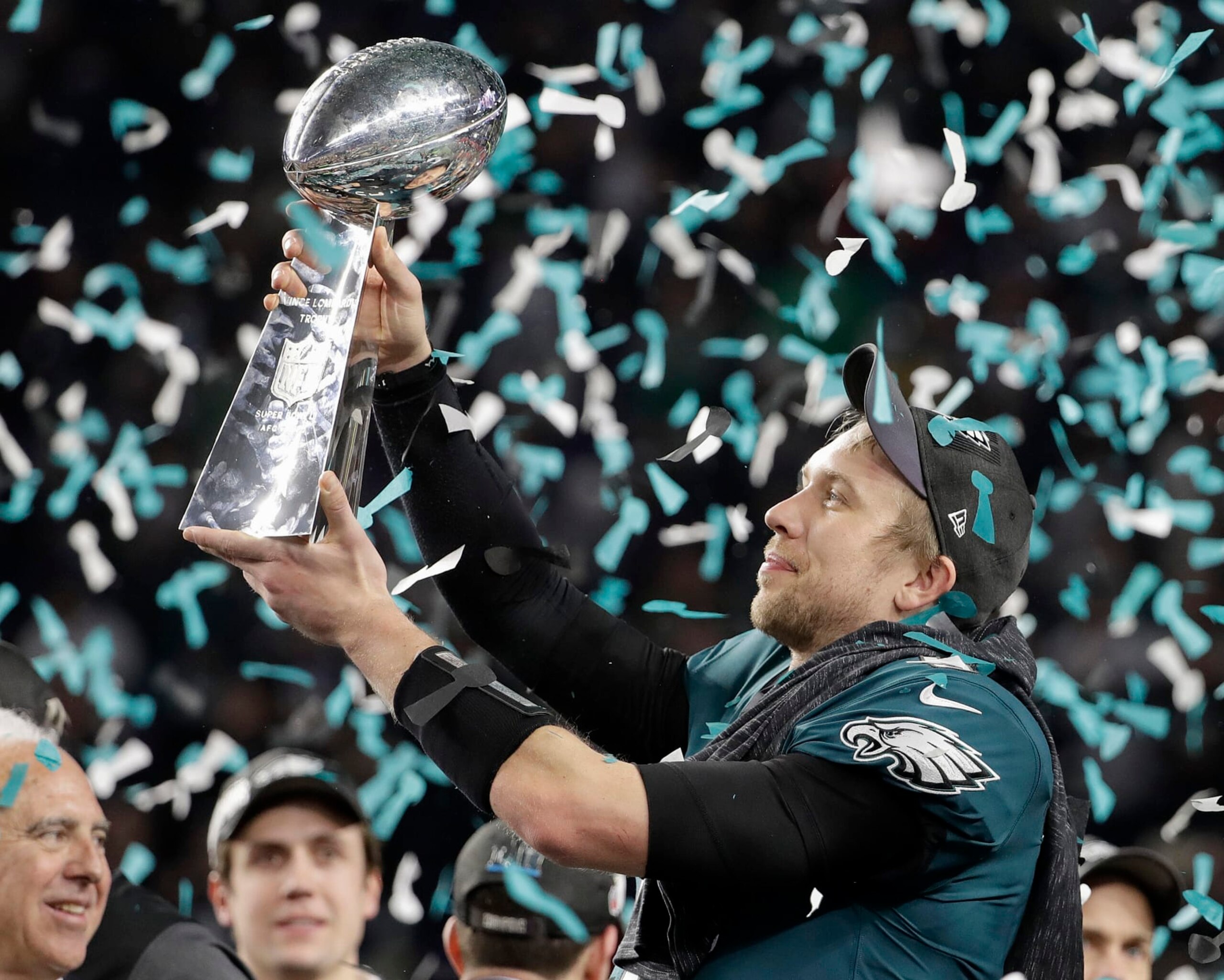 FILE - Philadelphia Eagles' Nick Foles holds up the Vince Lombardi Trophy after the NFL Super Bowl 52 football game against the New England Patriots, Sunday, Feb. 4, 2018, in Minneapolis. The Eagles won 41-33. (AP Photo/Chris O'Meara, File)
