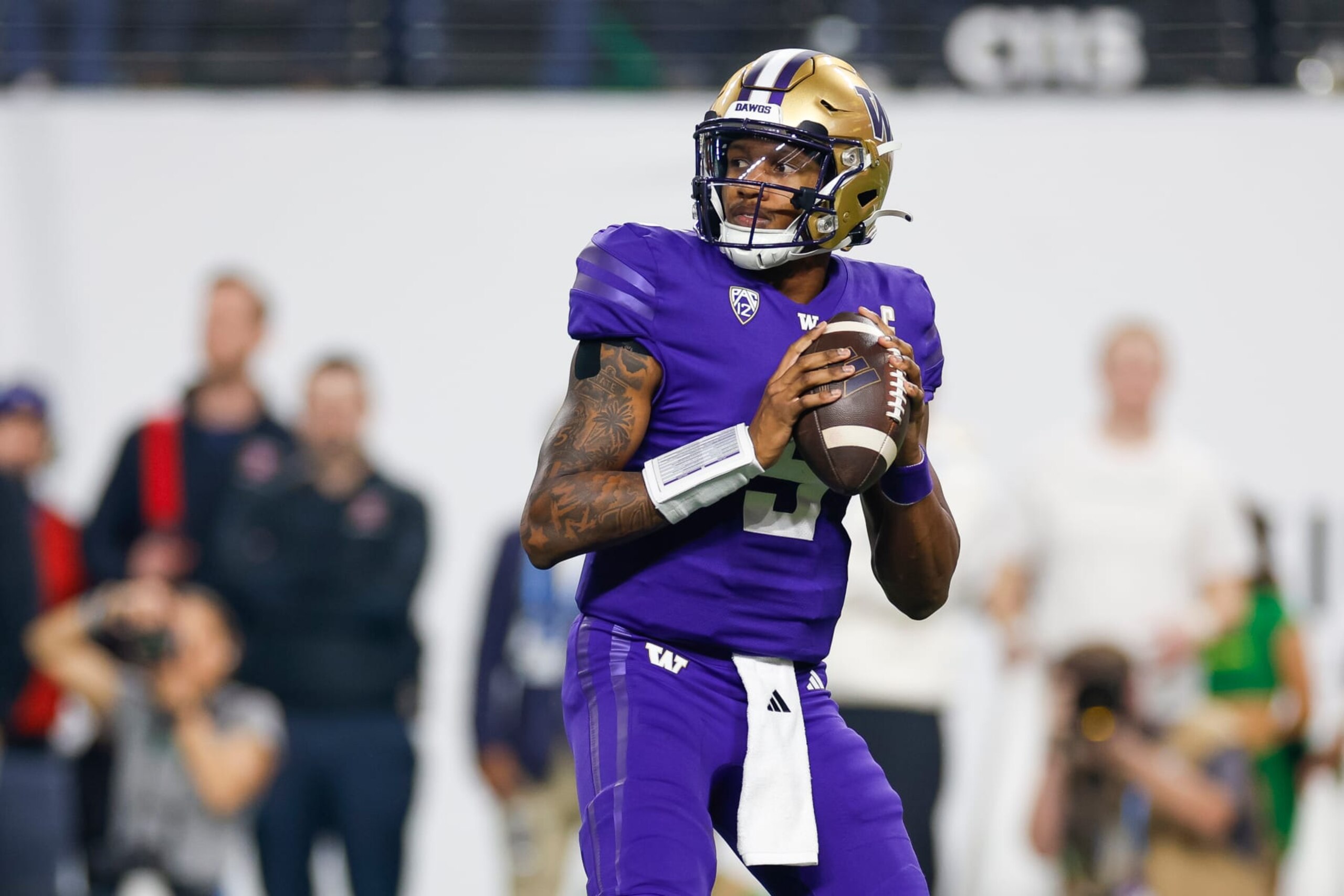 LAS VEGAS, NEVADA - DECEMBER 1: Michael Penix Jr. #9 of the Washington Huskies looks for an open receiver during the Pac-12 Championship game against the Oregon Ducks at Allegiant Stadium on December 1, 2023 in Las Vegas, Nevada. (Photo by Brandon Sloter/Image Of Sport/Getty Images) LAS VEGAS, NEVADA - DECEMBER 1: Michael Penix Jr. #9 of the Washington Huskies looks for an open receiver during the Pac-12 Championship game against the Oregon Ducks at Allegiant Stadium on December 1, 2023 in Las Vegas, Nevada. (Photo by Brandon Sloter/Image Of Sport/Getty Images)